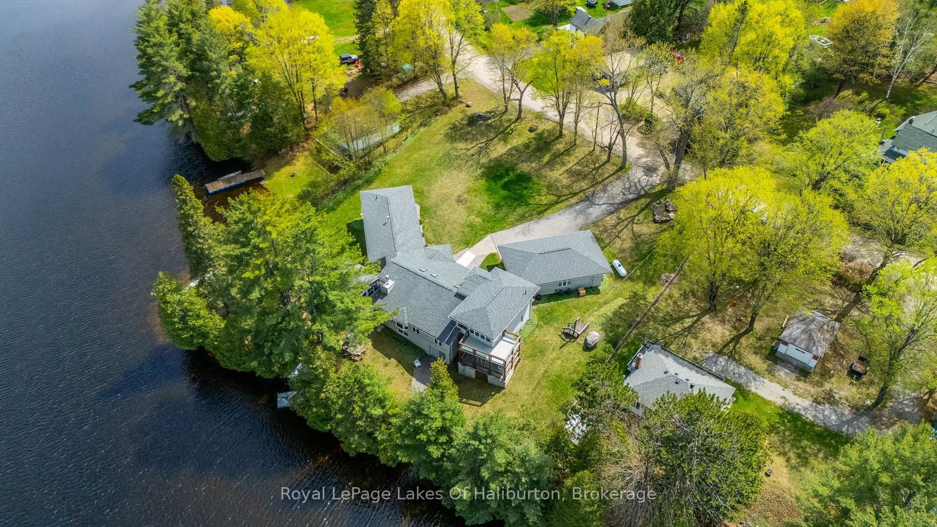 A pic from outside/outdoor area/front of a property/back of a property/a pic from drone, water/lake/river/ocean view for 1089 Pioneer Rd, Highlands East Ontario K0M 1R0