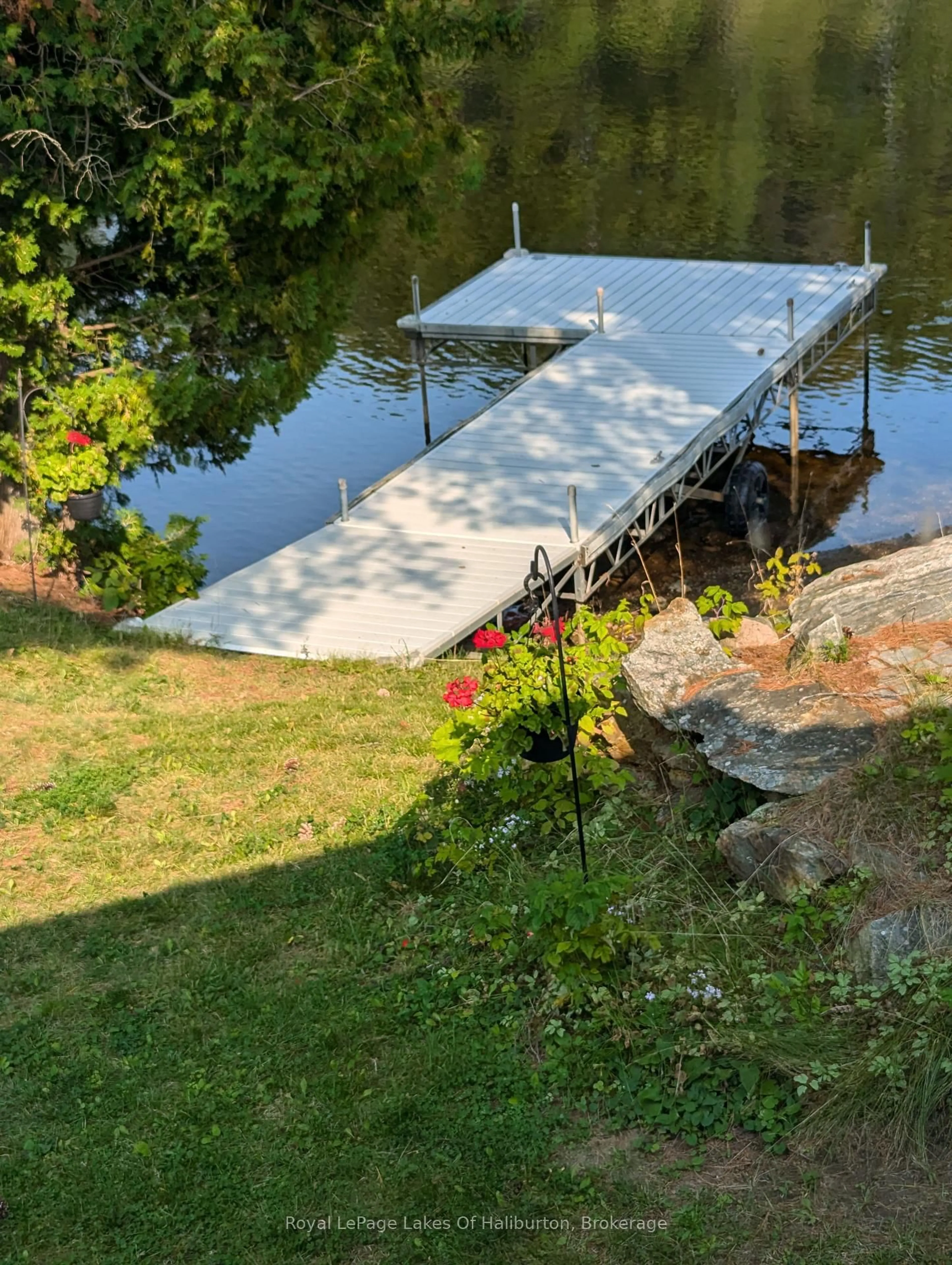 A pic from outside/outdoor area/front of a property/back of a property/a pic from drone, water/lake/river/ocean view for 1089 Pioneer Rd, Highlands East Ontario K0M 1R0