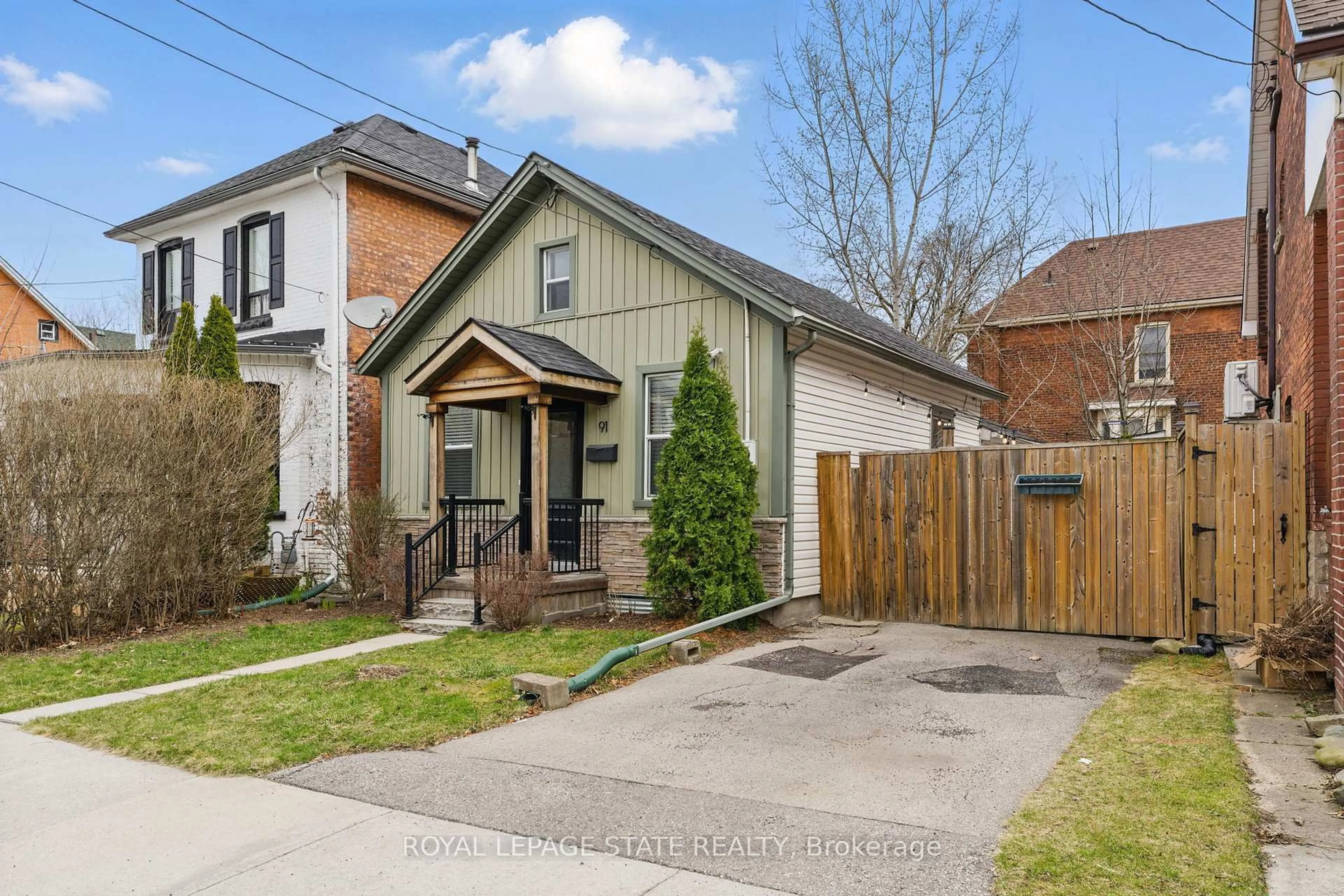 Home with brick exterior material, street for 91 Aurora St, Hamilton Ontario L8N 2P6