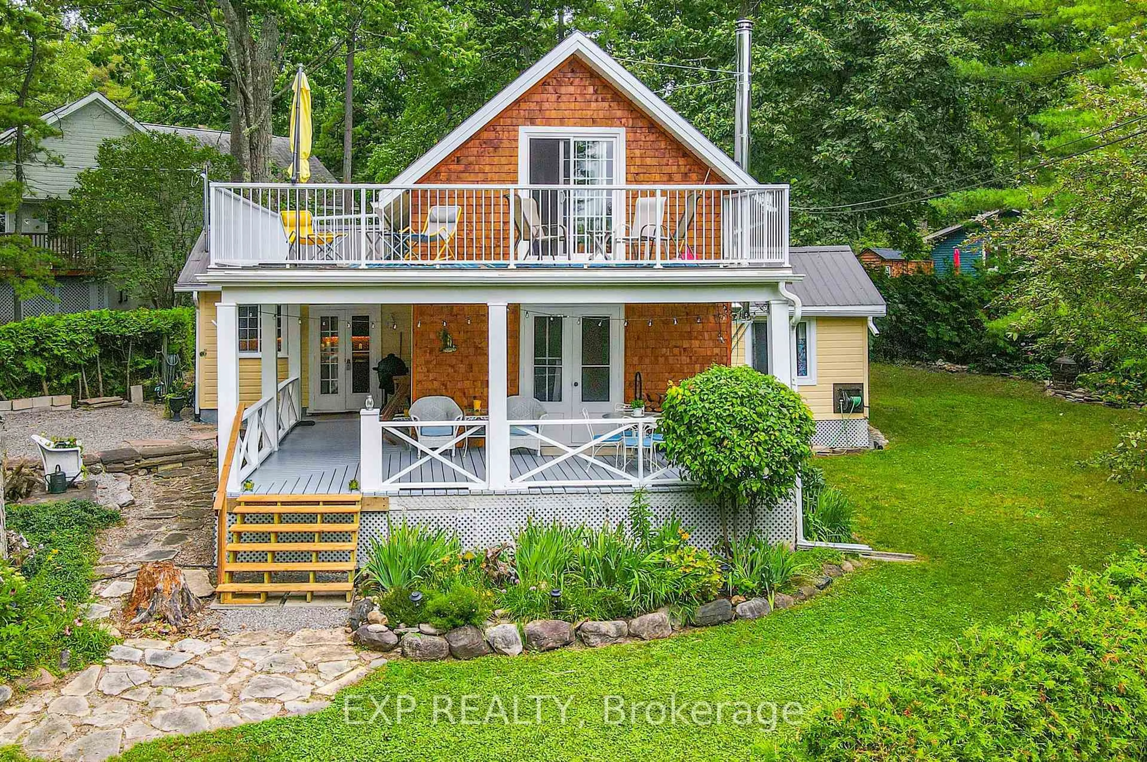 A pic from outside/outdoor area/front of a property/back of a property/a pic from drone, water/lake/river/ocean view for 10 Sixth St, Kawartha Lakes Ontario K0M 1N0