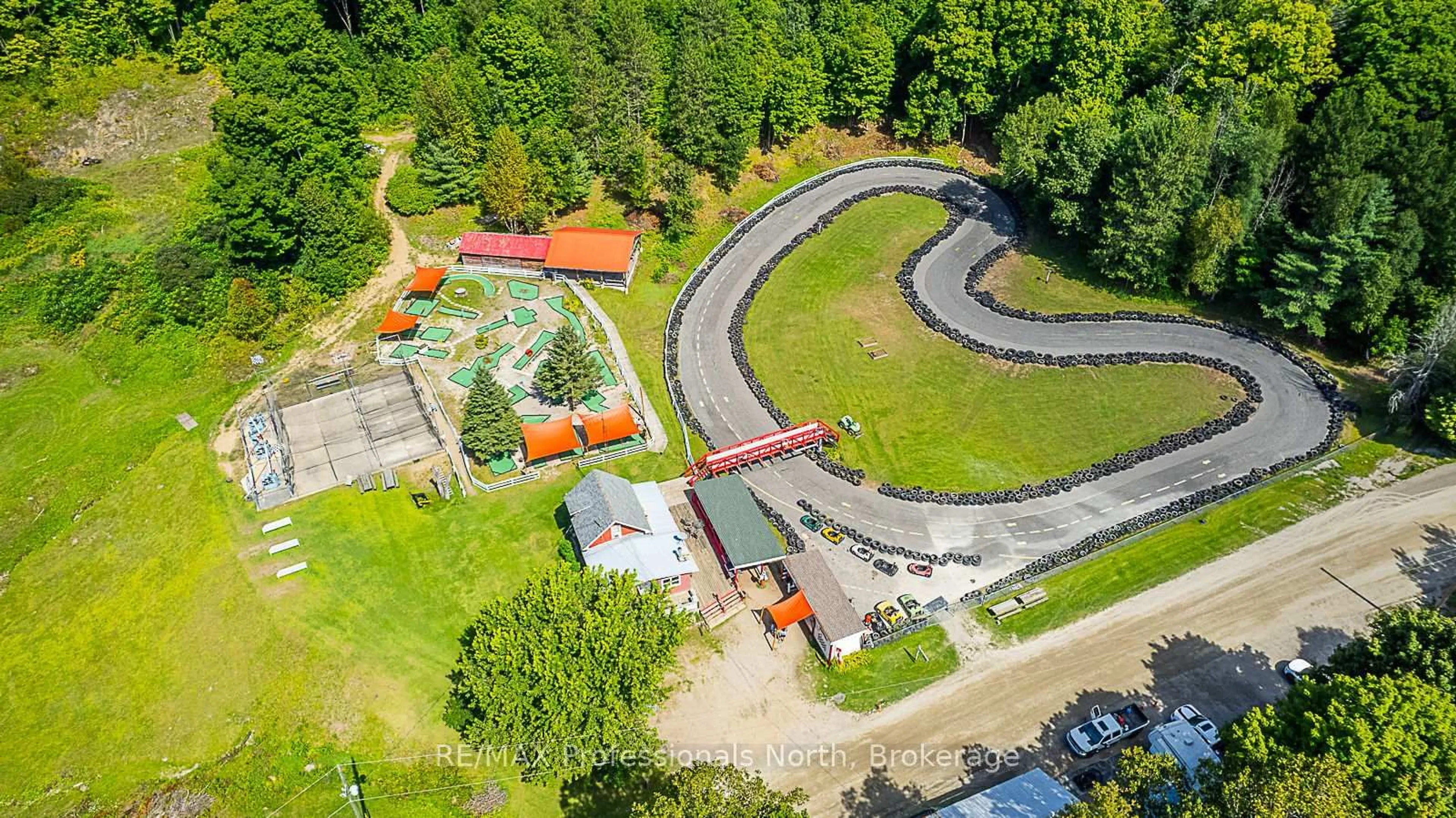 A pic from outside/outdoor area/front of a property/back of a property/a pic from drone, street for 1063 RAVINE Rd, Minden Hills Ontario K0M 2K0