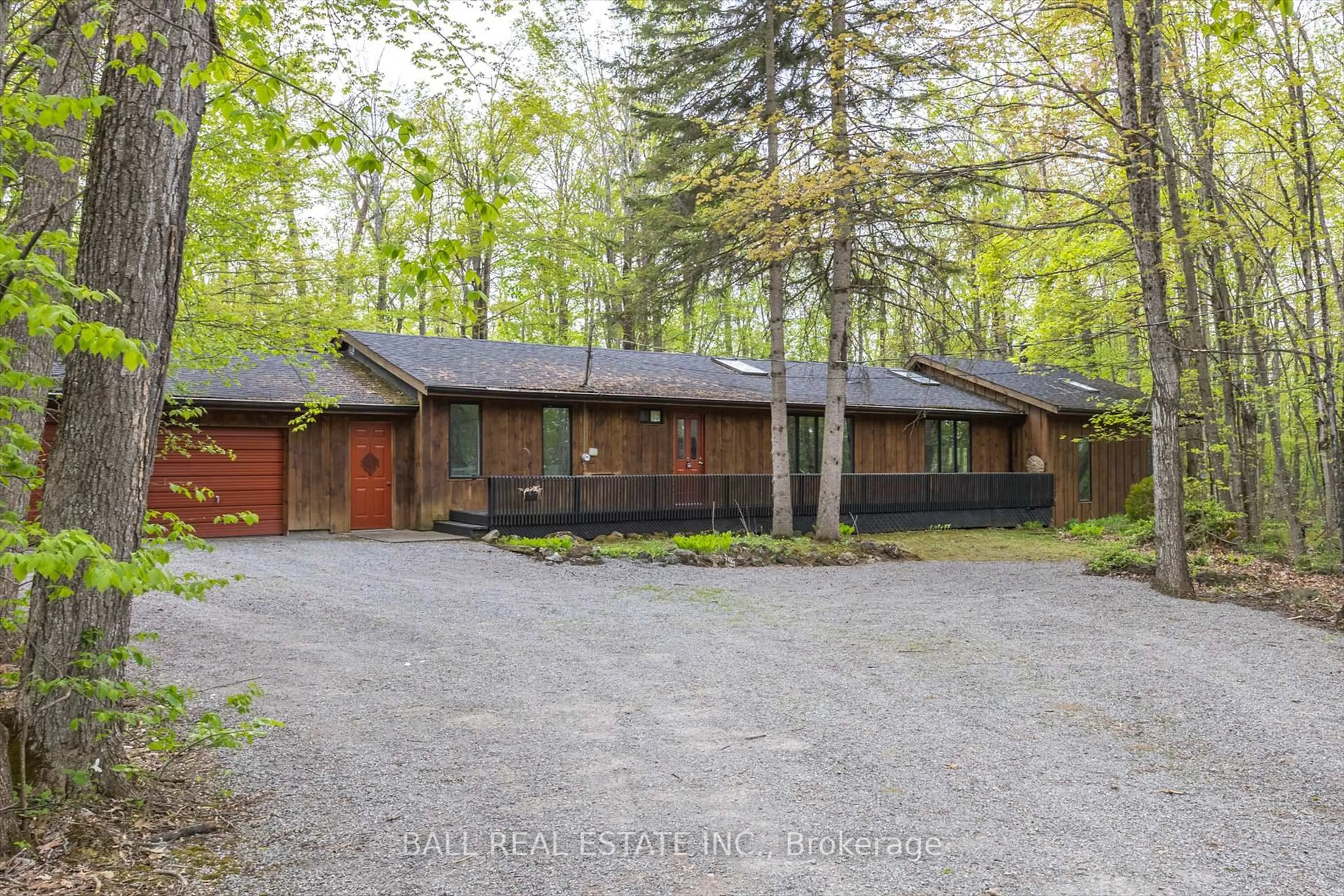 A pic from outside/outdoor area/front of a property/back of a property/a pic from drone, unknown for 21 Beech Terr, Trent Lakes Ontario K0L 1J0