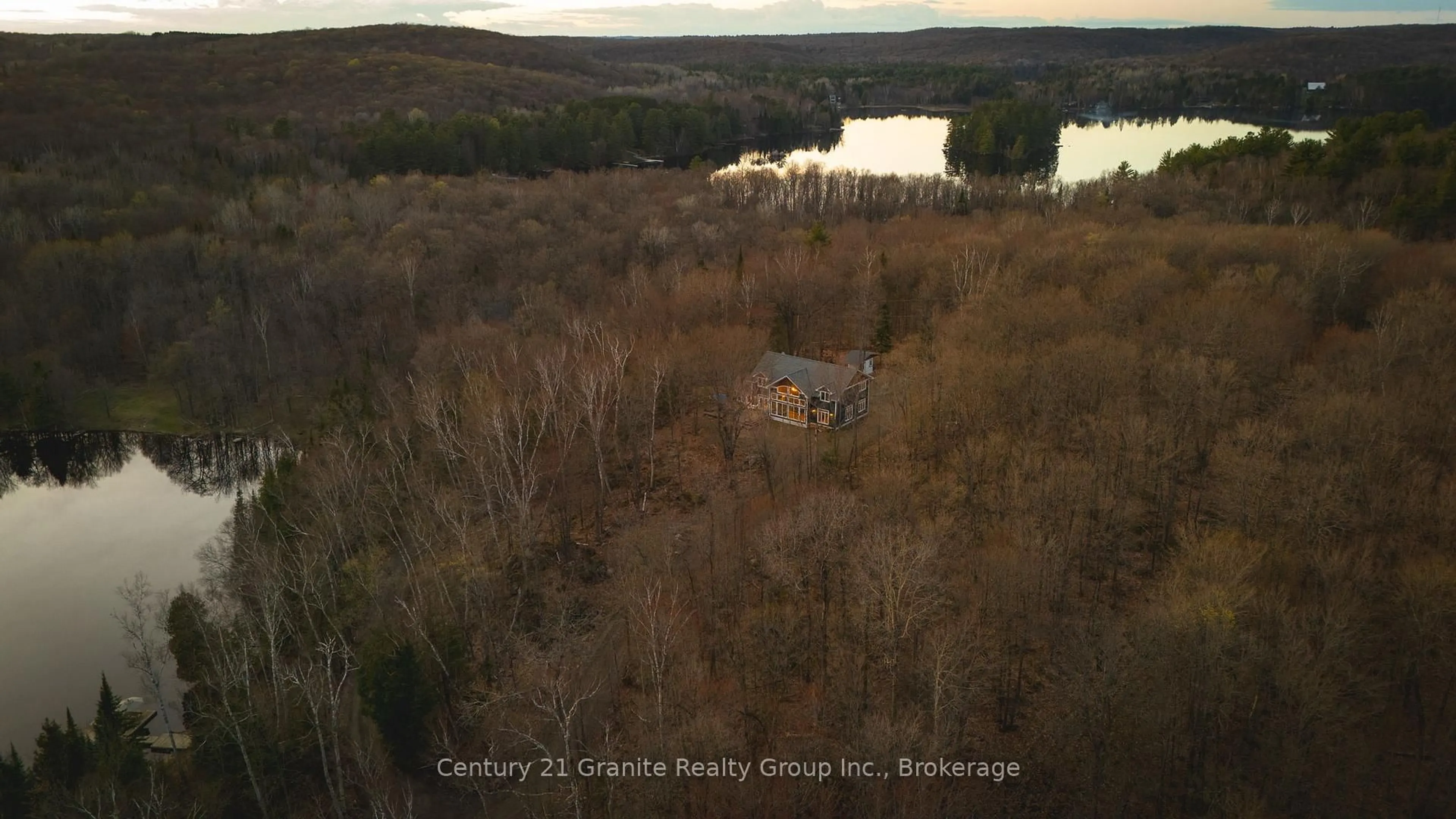 A pic from outside/outdoor area/front of a property/back of a property/a pic from drone, water/lake/river/ocean view for 1277 Grace Rd, Minden Hills Ontario K0M 2K0