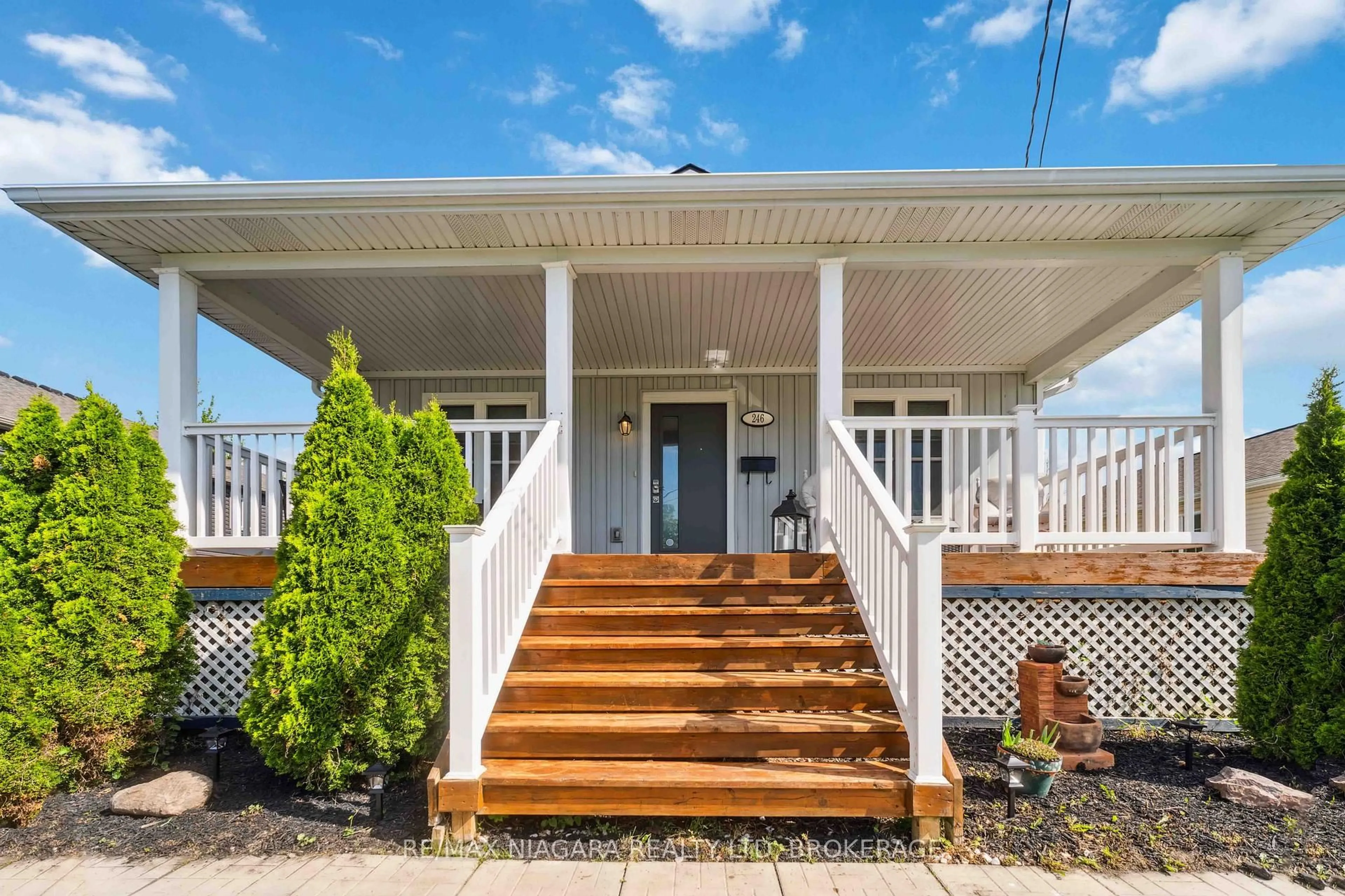 Home with vinyl exterior material, street for 246 MARTIN St, Welland Ontario L3C 7L5