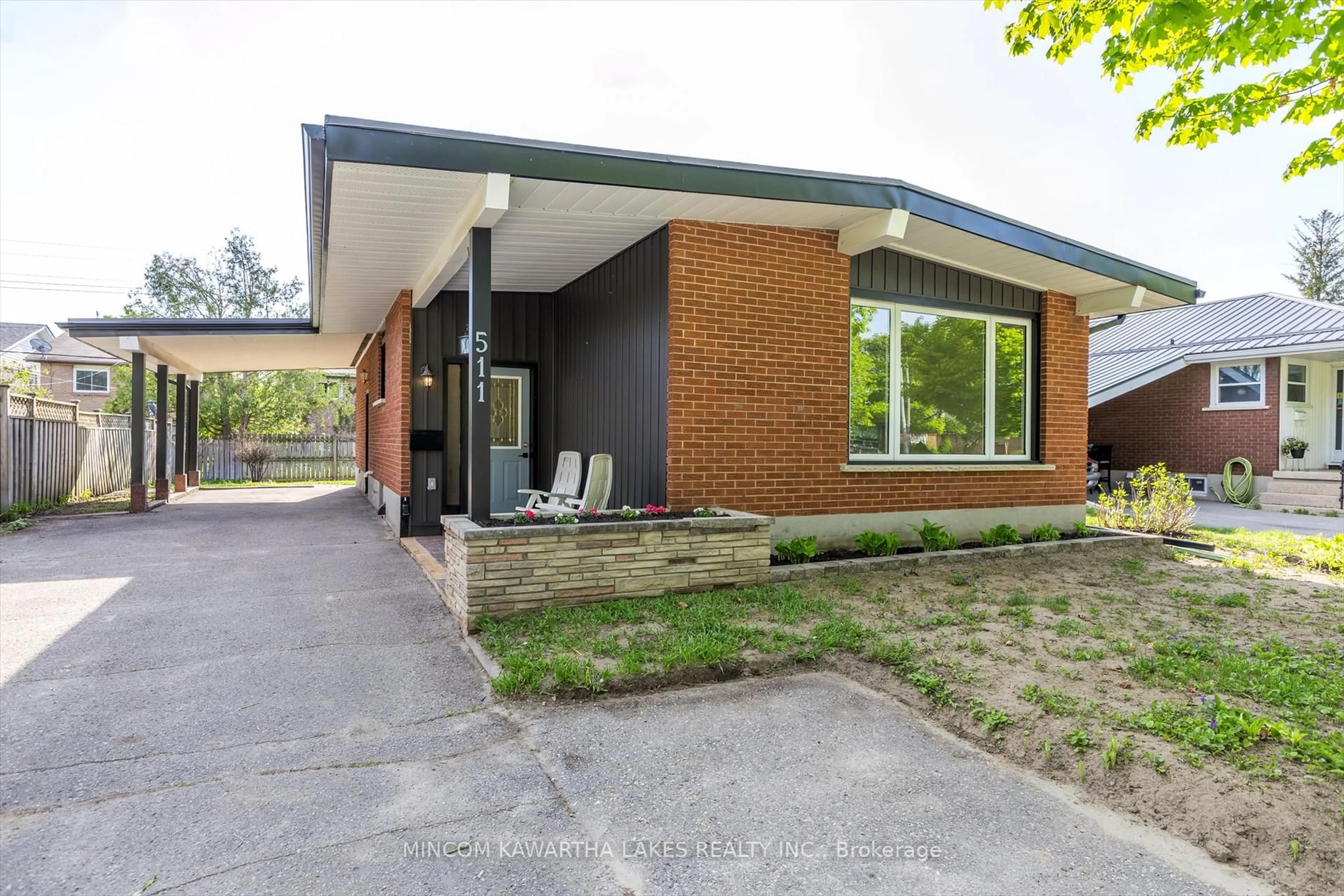 Home with brick exterior material, street for 511 Robert Rd, Peterborough South Ontario K9J 5S9