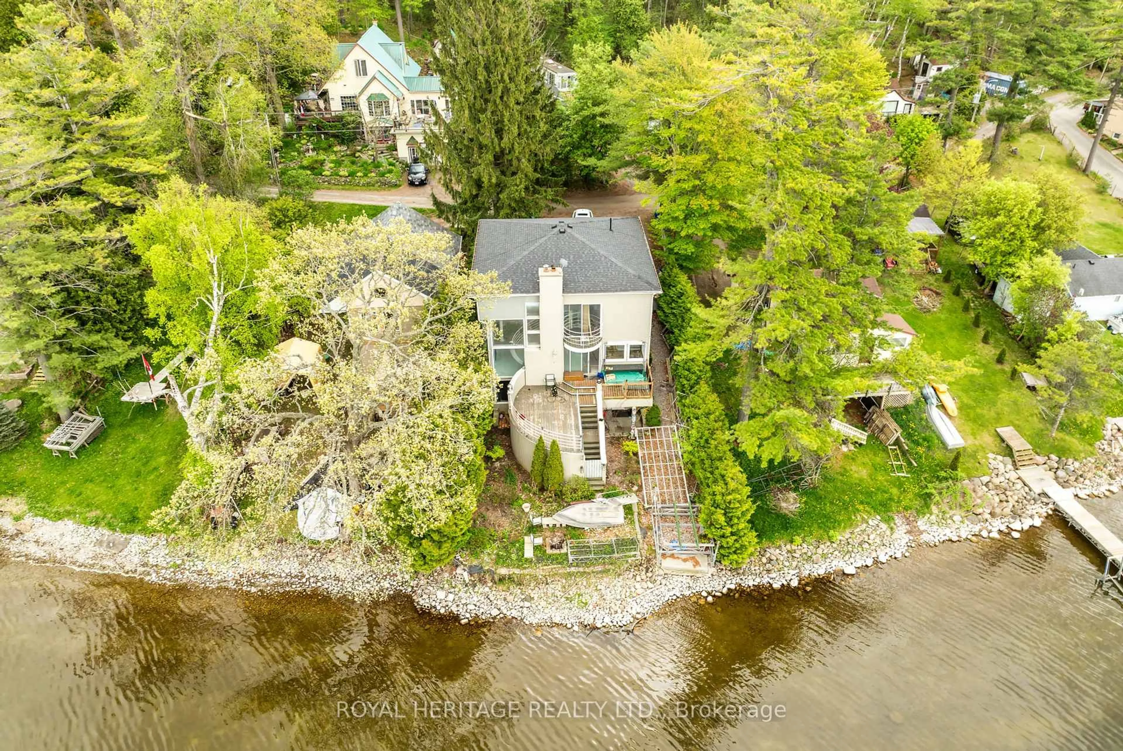 A pic from outside/outdoor area/front of a property/back of a property/a pic from drone, water/lake/river/ocean view for 8018 Taits Beach Rd #180, Hamilton Township Ontario K0L 1E0