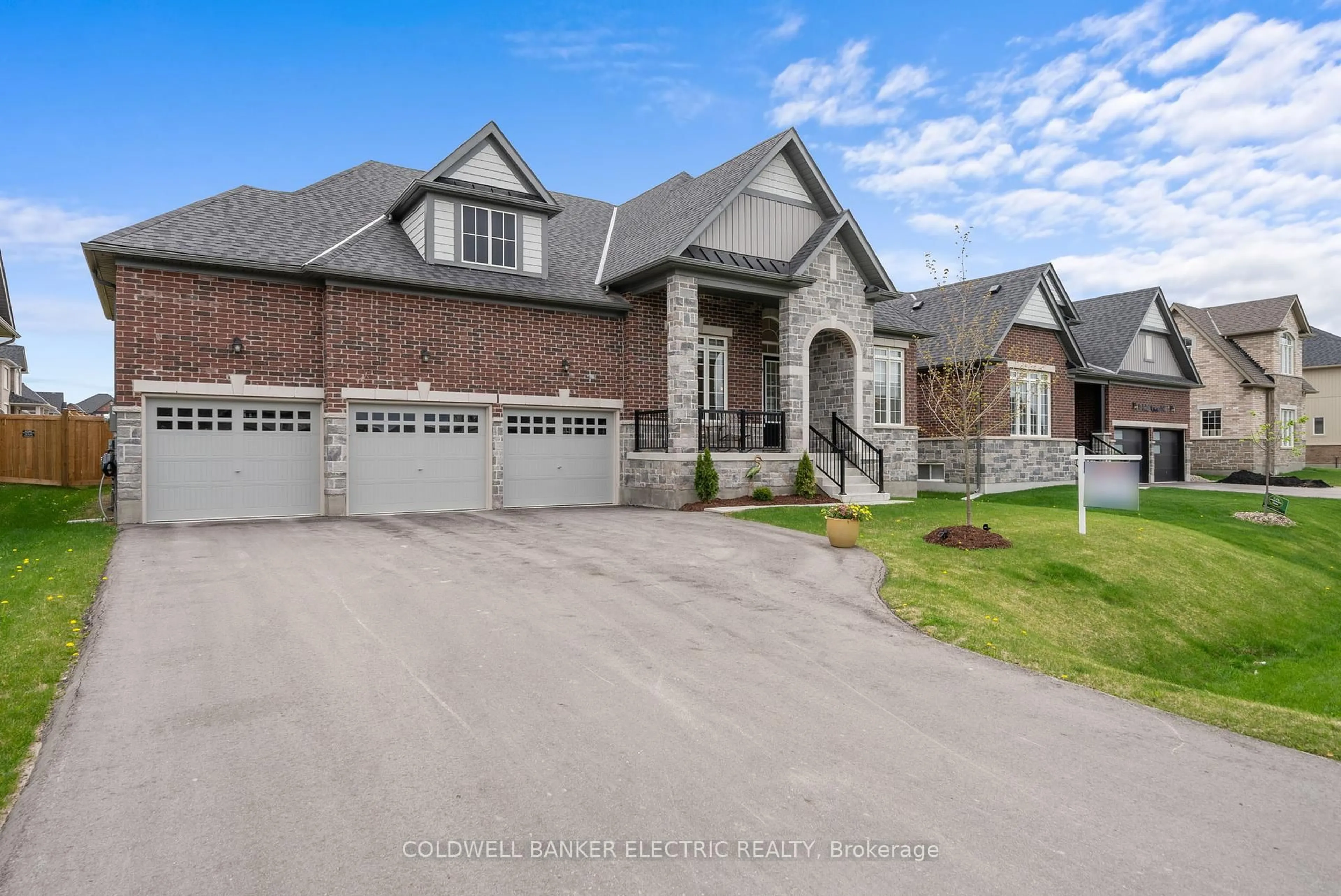 Home with brick exterior material, street for 11 Golden Meadows Dr, Otonabee-South Monaghan Ontario K9J 0K7