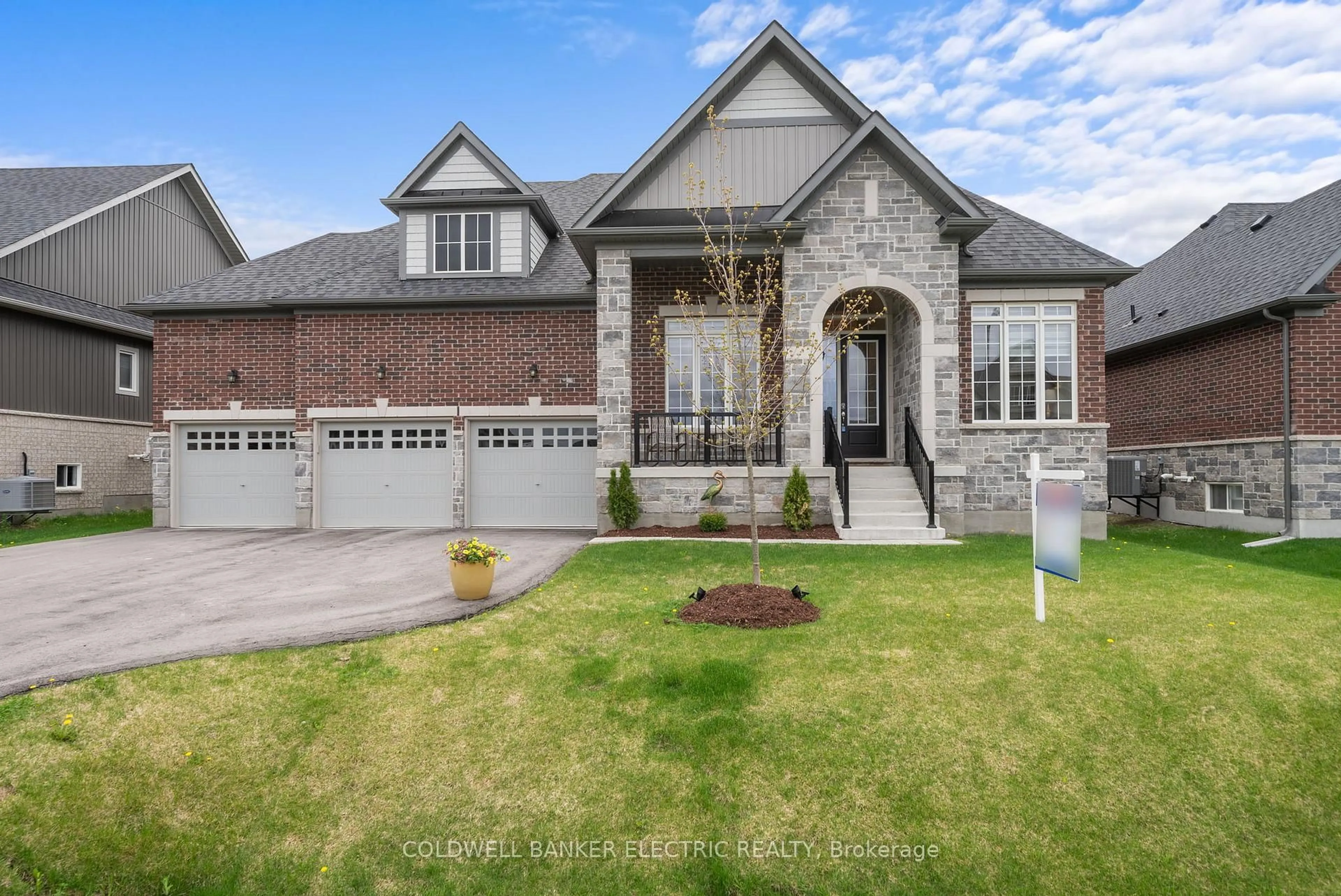 Home with brick exterior material, street for 11 Golden Meadows Dr, Otonabee-South Monaghan Ontario K9J 0K7