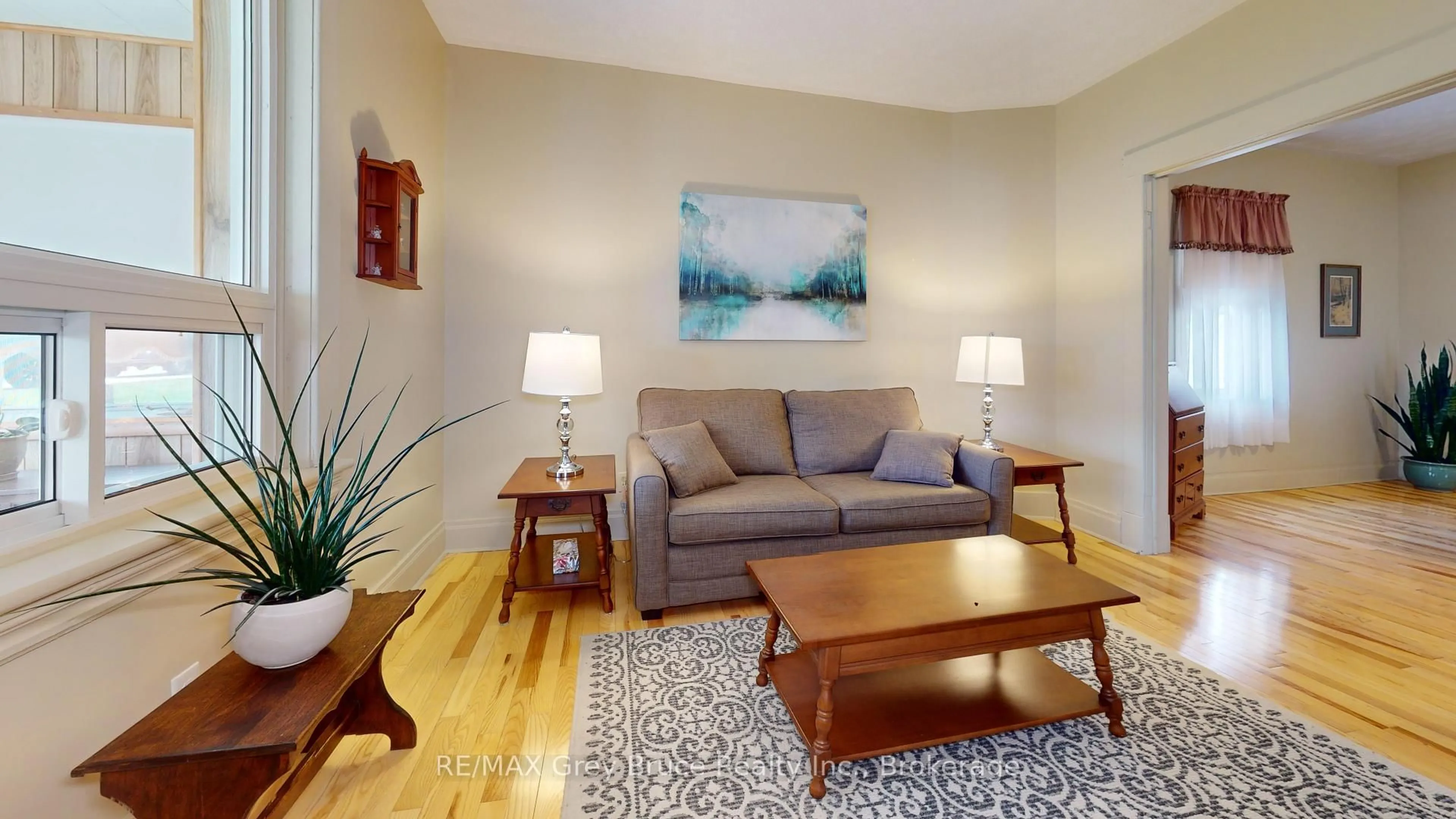 Living room with furniture, wood/laminate floor for 391 1st Ave, Arran-Elderslie Ontario N0G 1L0