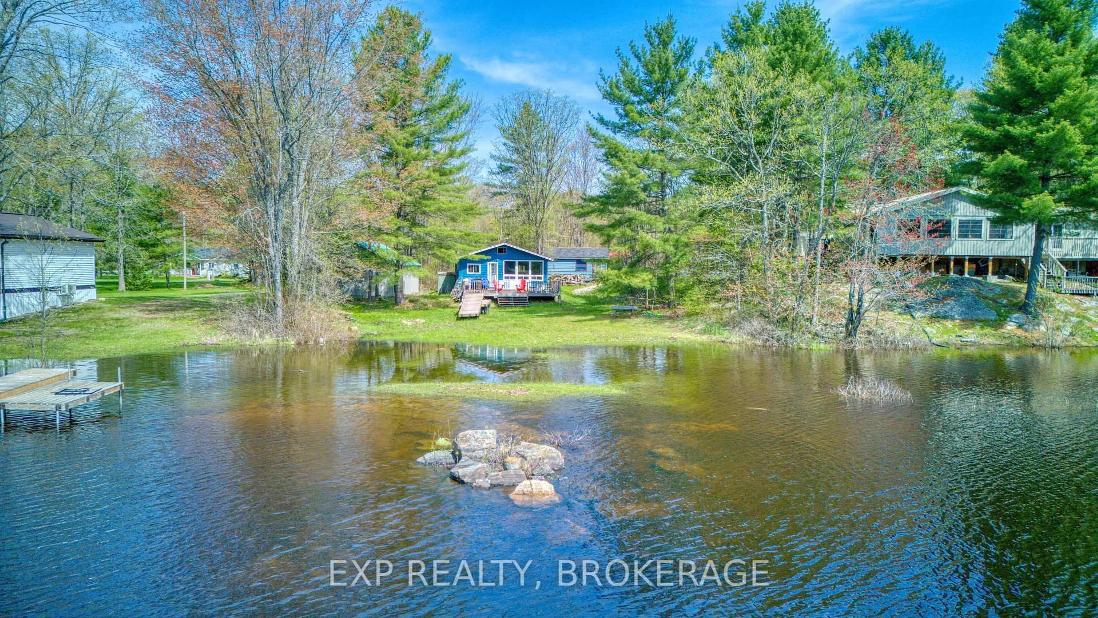 A pic from outside/outdoor area/front of a property/back of a property/a pic from drone, water/lake/river/ocean view for 1036 Turner Way, Arden Ontario K0H 1B0