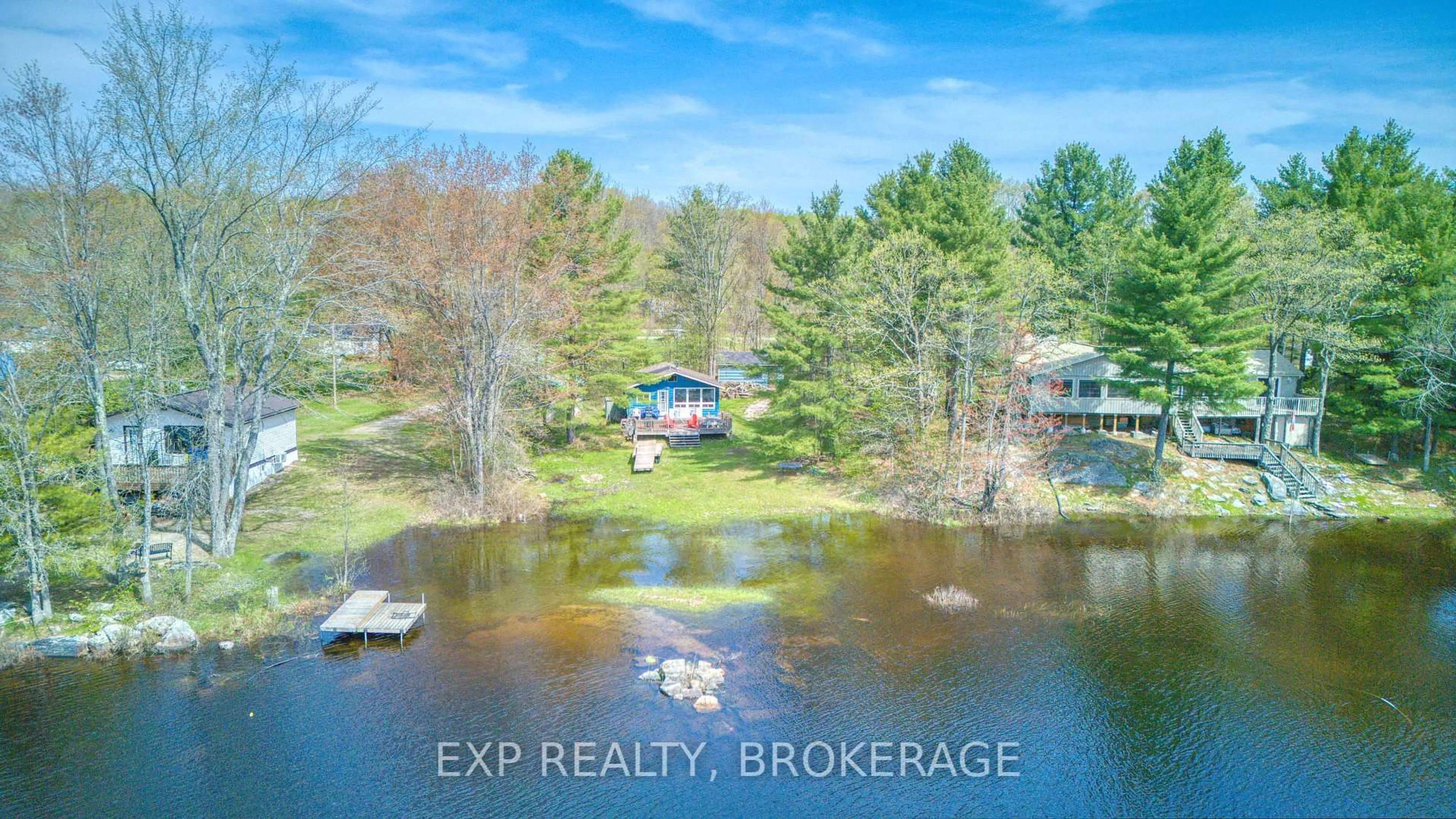 A pic from outside/outdoor area/front of a property/back of a property/a pic from drone, water/lake/river/ocean view for 1036 Turner Way, Arden Ontario K0H 1B0