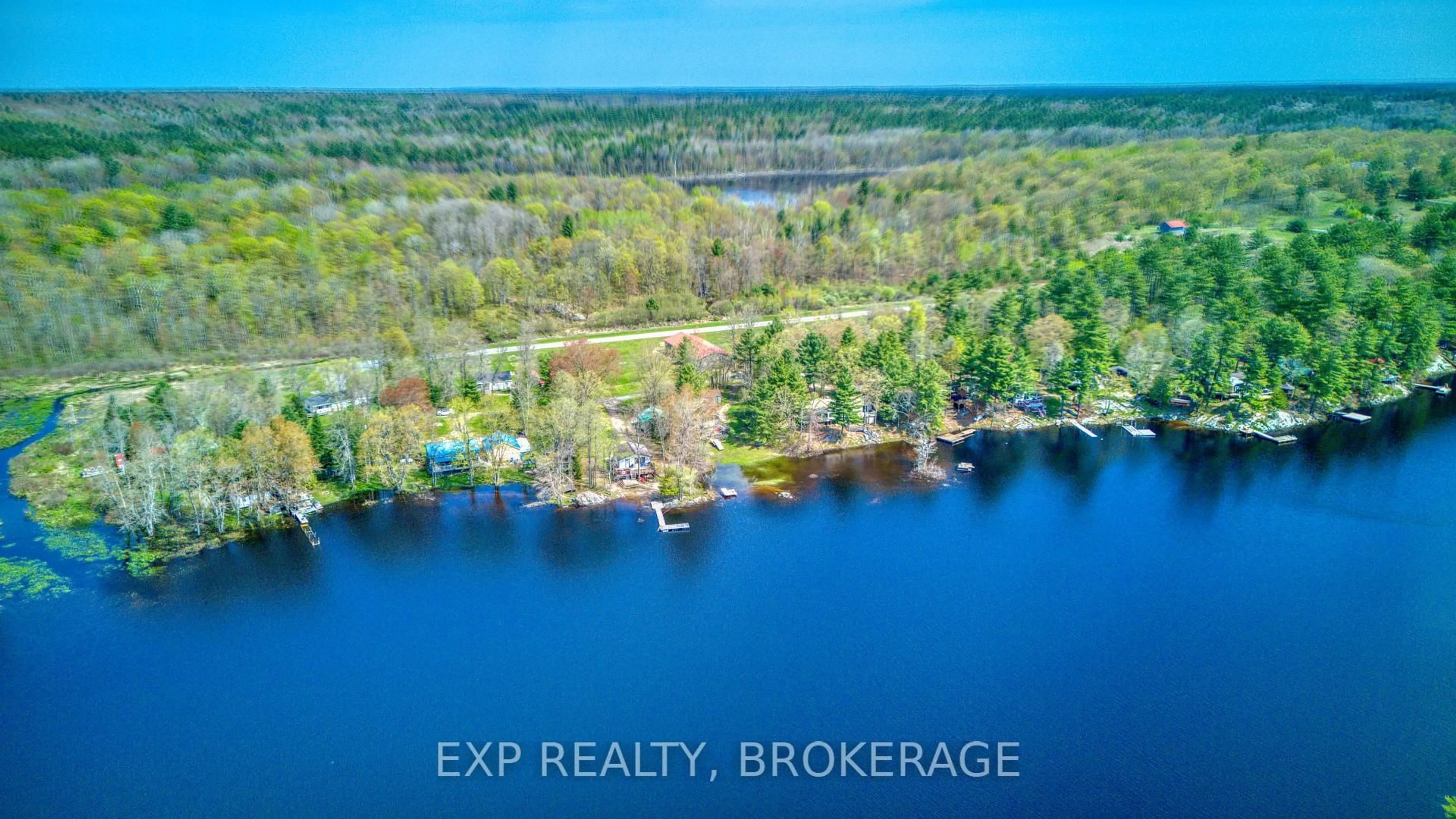 A pic from outside/outdoor area/front of a property/back of a property/a pic from drone, water/lake/river/ocean view for 1036 Turner Way, Arden Ontario K0H 1B0