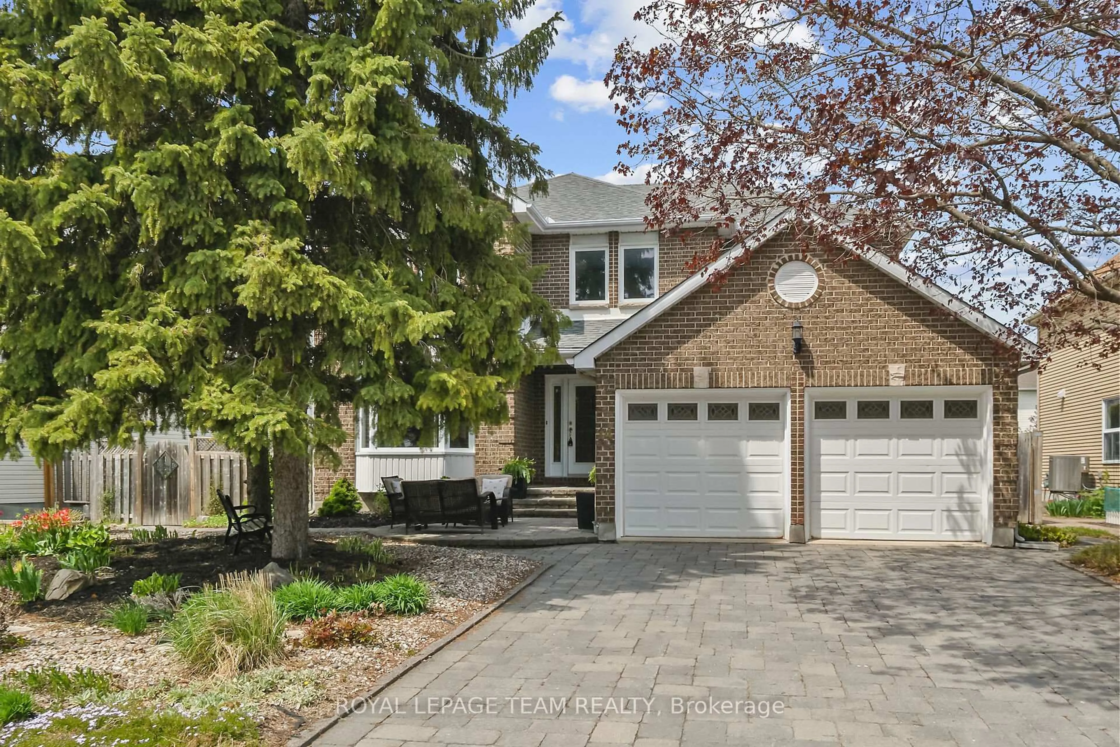 Home with brick exterior material, street for 14 Morgan's Grant Way, Ottawa Ontario K2K 2G5