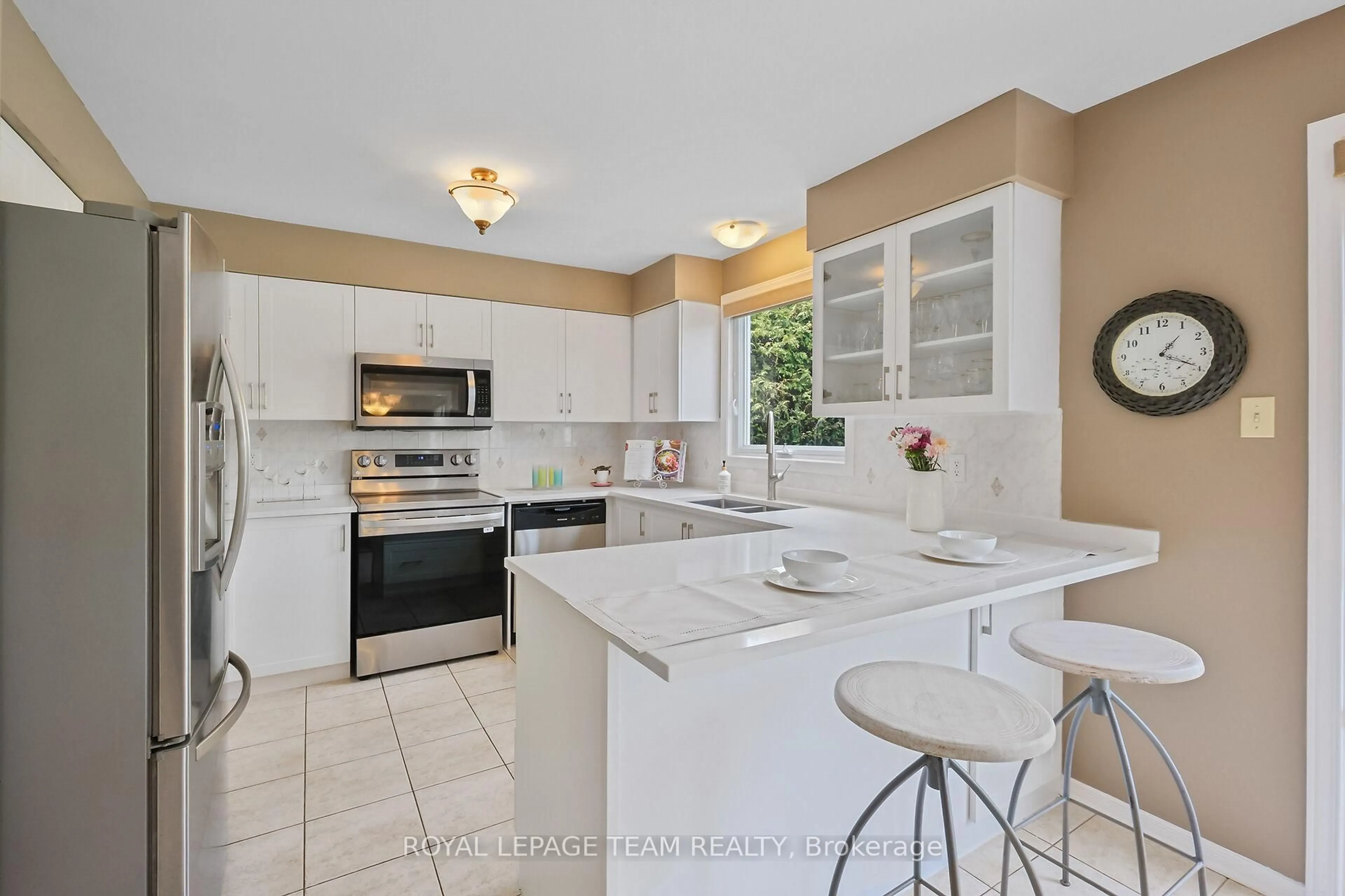 Open concept kitchen, ceramic/tile floor for 14 Morgan's Grant Way, Ottawa Ontario K2K 2G5