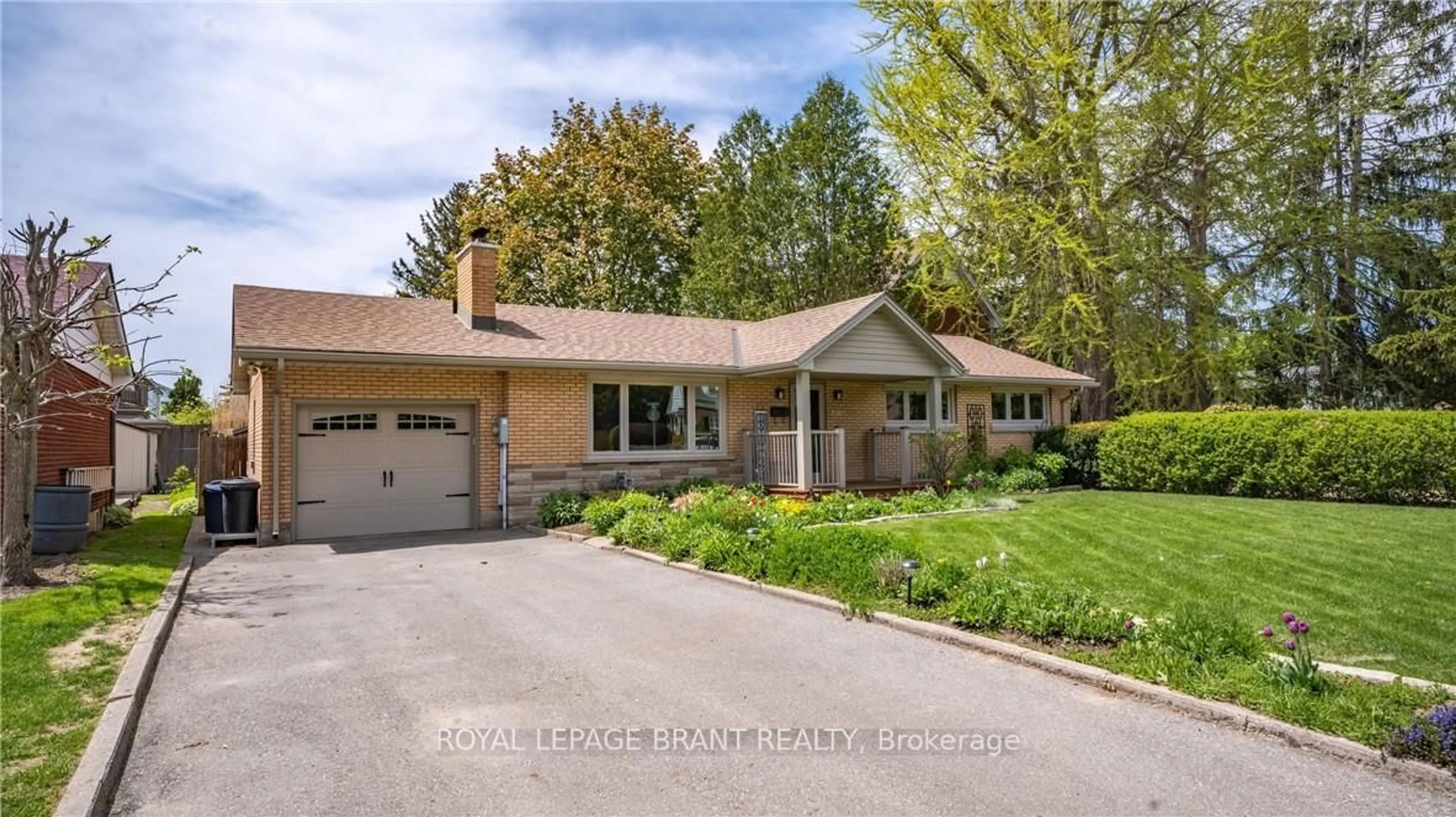 Home with brick exterior material, street for 283 Erie Ave, Brantford Ontario N3S 2H5