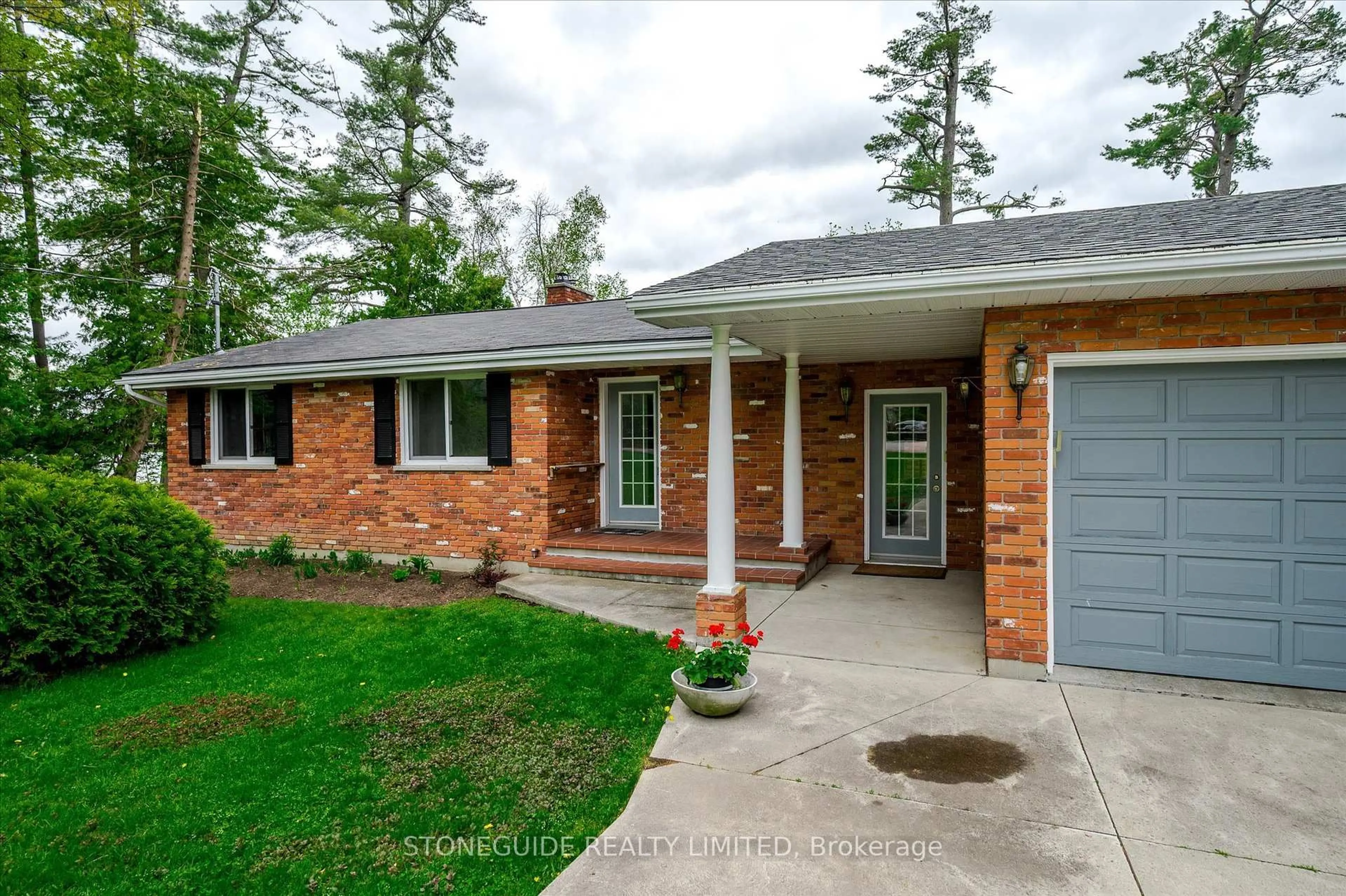 Home with brick exterior material, street for 917 Tindle Crt, Selwyn Ontario K9J 0C5