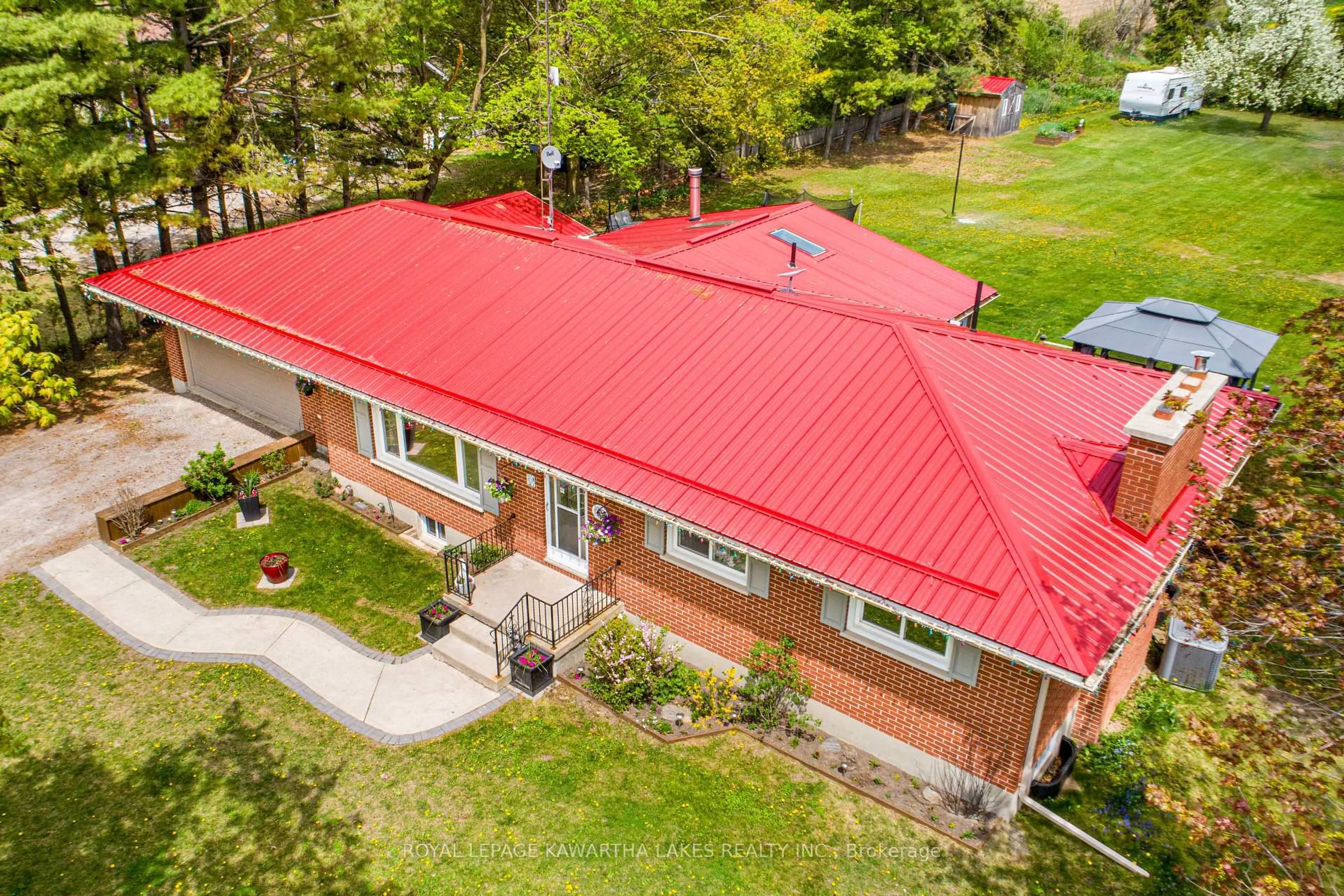 A pic from outside/outdoor area/front of a property/back of a property/a pic from drone, building for 1372 Elm Tree Rd, Kawartha Lakes Ontario K9V 4R2
