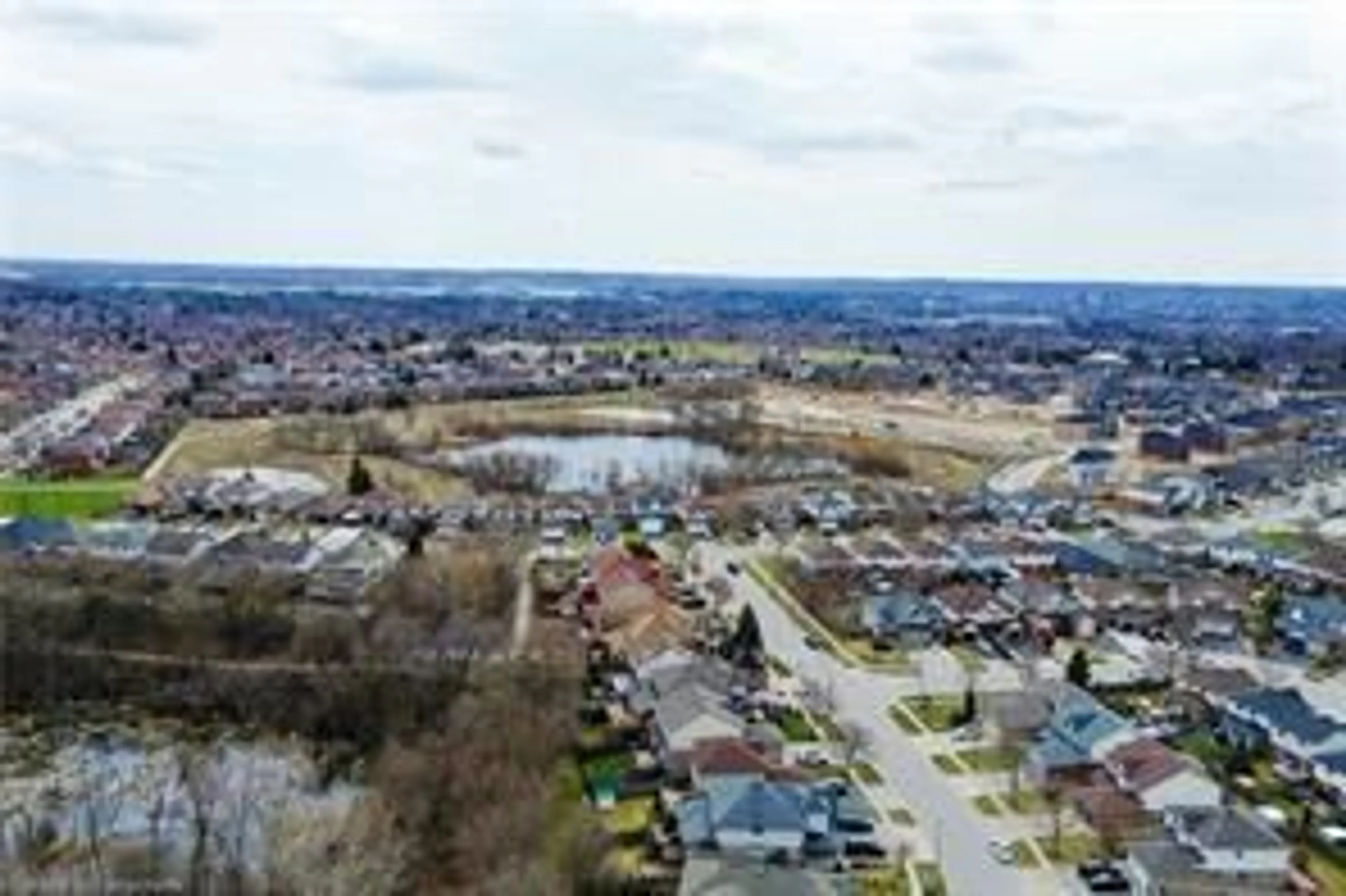 A pic from outside/outdoor area/front of a property/back of a property/a pic from drone, water/lake/river/ocean view for 76 Country Club Dr, Cambridge Ontario N1T 1Z8