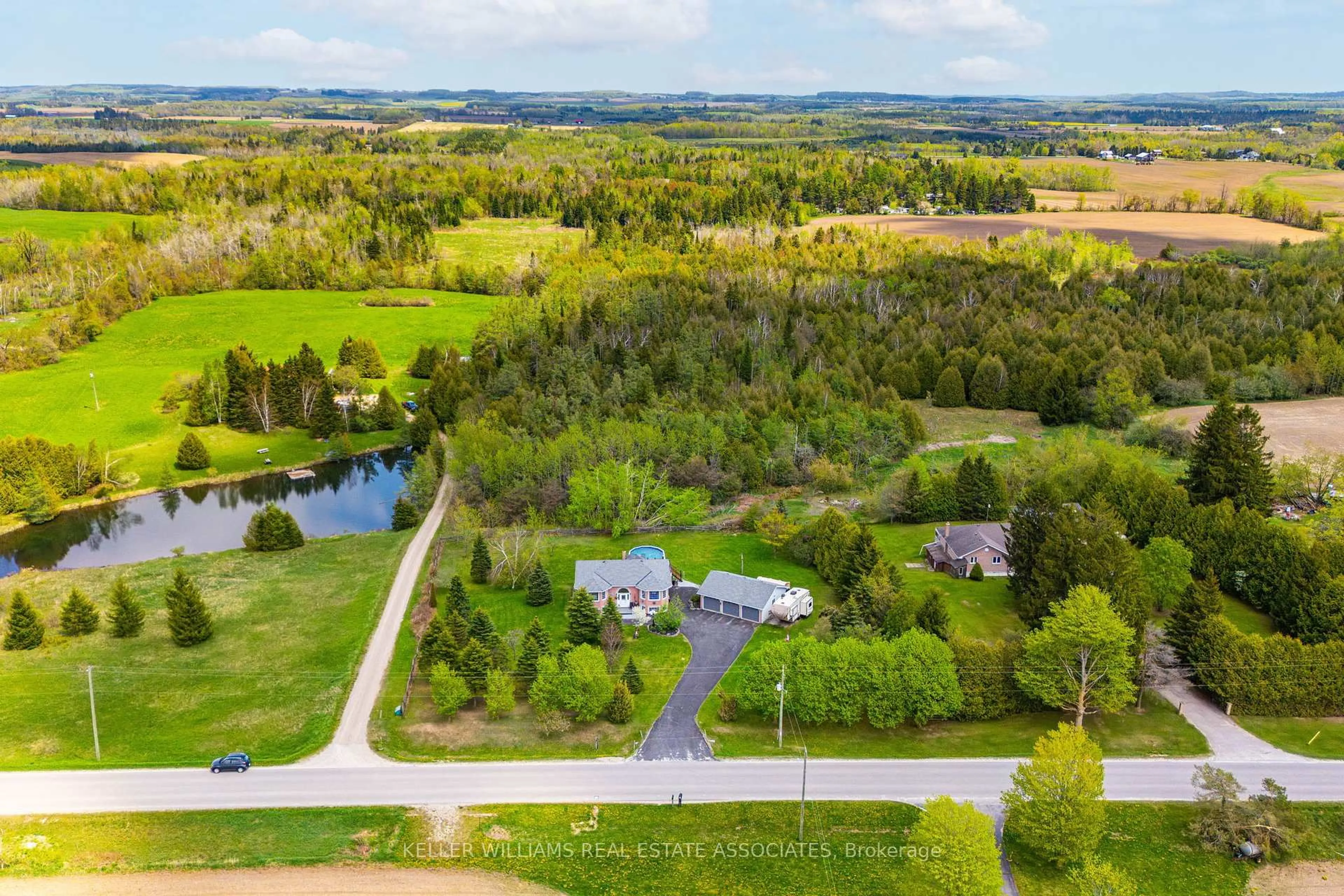 A pic from outside/outdoor area/front of a property/back of a property/a pic from drone, water/lake/river/ocean view for 436451 4th Line, Melancthon Ontario L9V 1S6