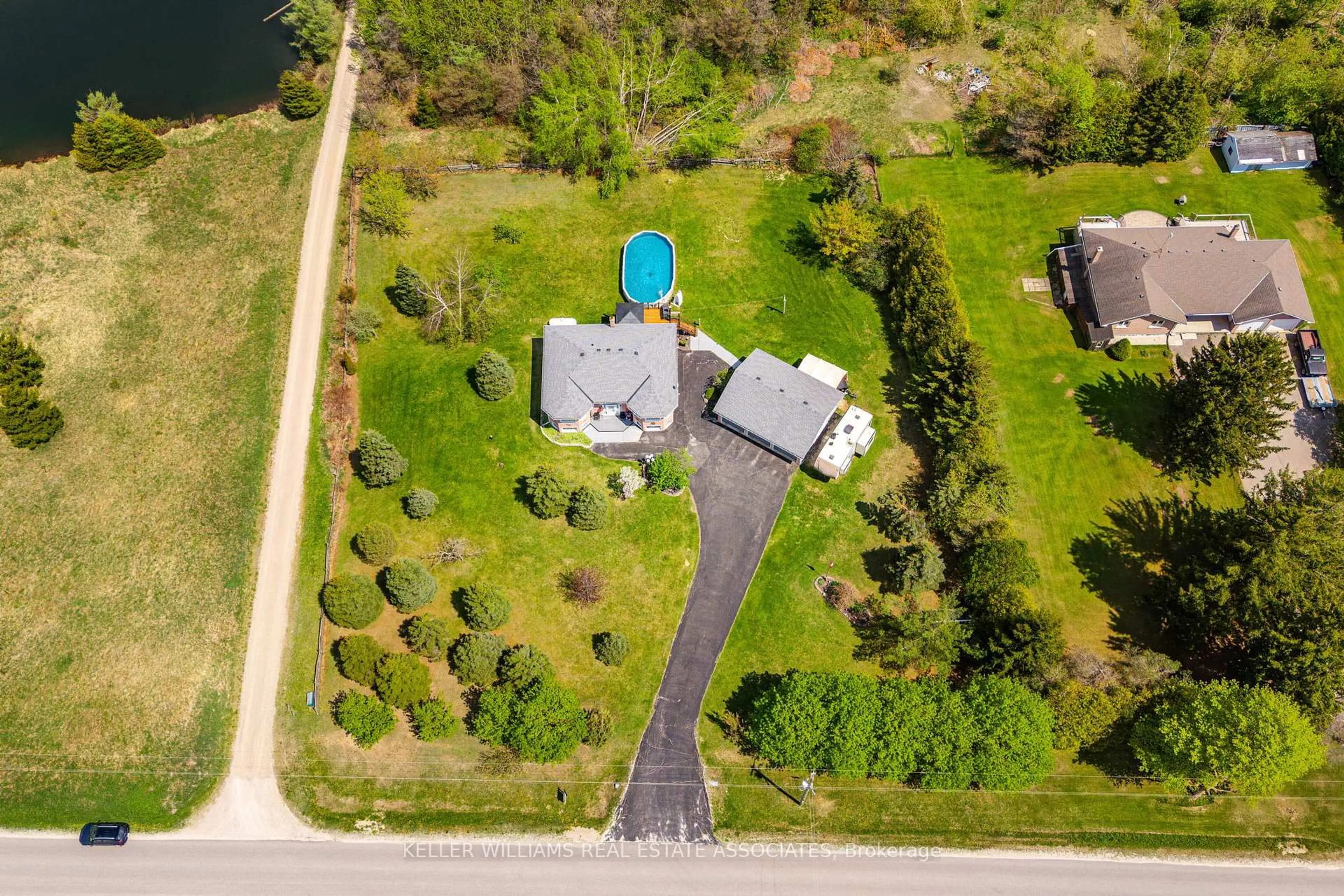 A pic from outside/outdoor area/front of a property/back of a property/a pic from drone, water/lake/river/ocean view for 436451 4th Line, Melancthon Ontario L9V 1S6