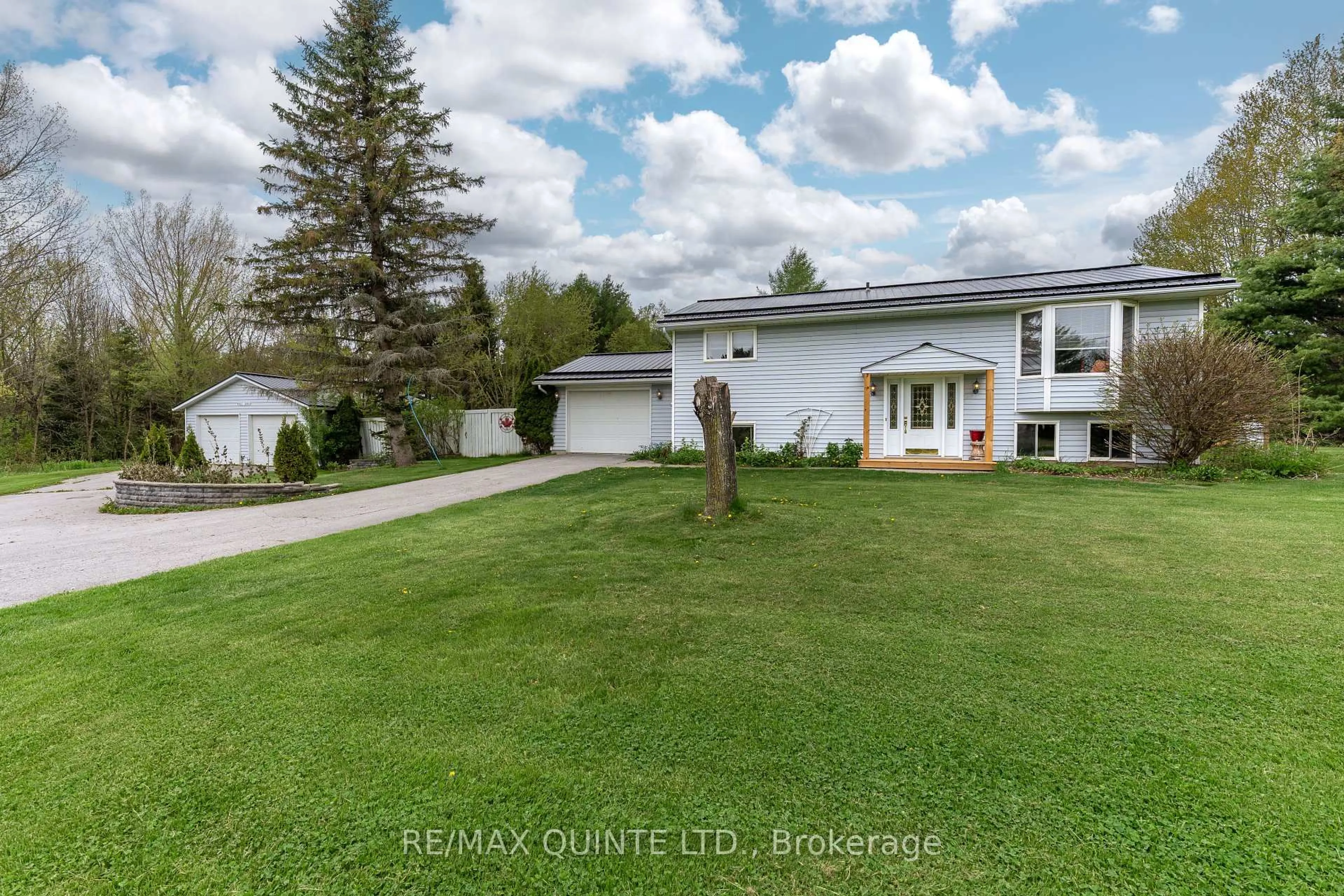 A pic from outside/outdoor area/front of a property/back of a property/a pic from drone, water/lake/river/ocean view for 32 McMurray Rd, Quinte West Ontario K8V 6A4
