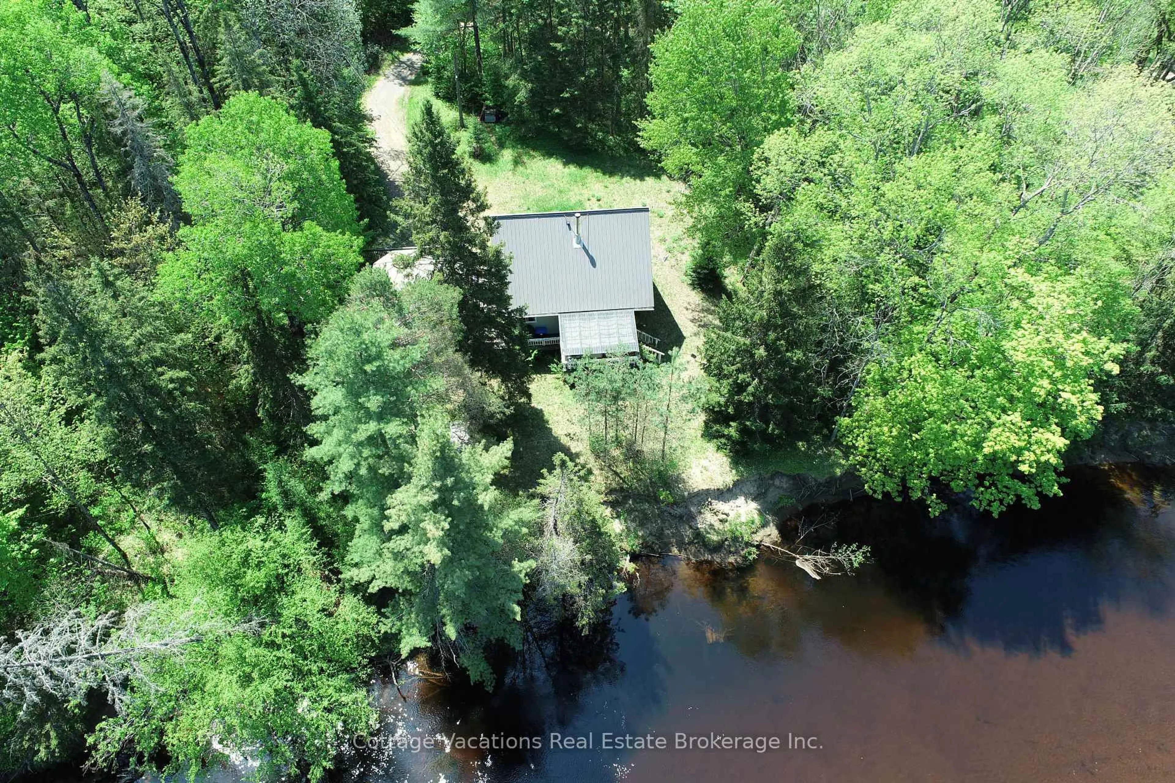 A pic from outside/outdoor area/front of a property/back of a property/a pic from drone, water/lake/river/ocean view for 341 OLD NORTH Rd, Huntsville Ontario P1H 2J4