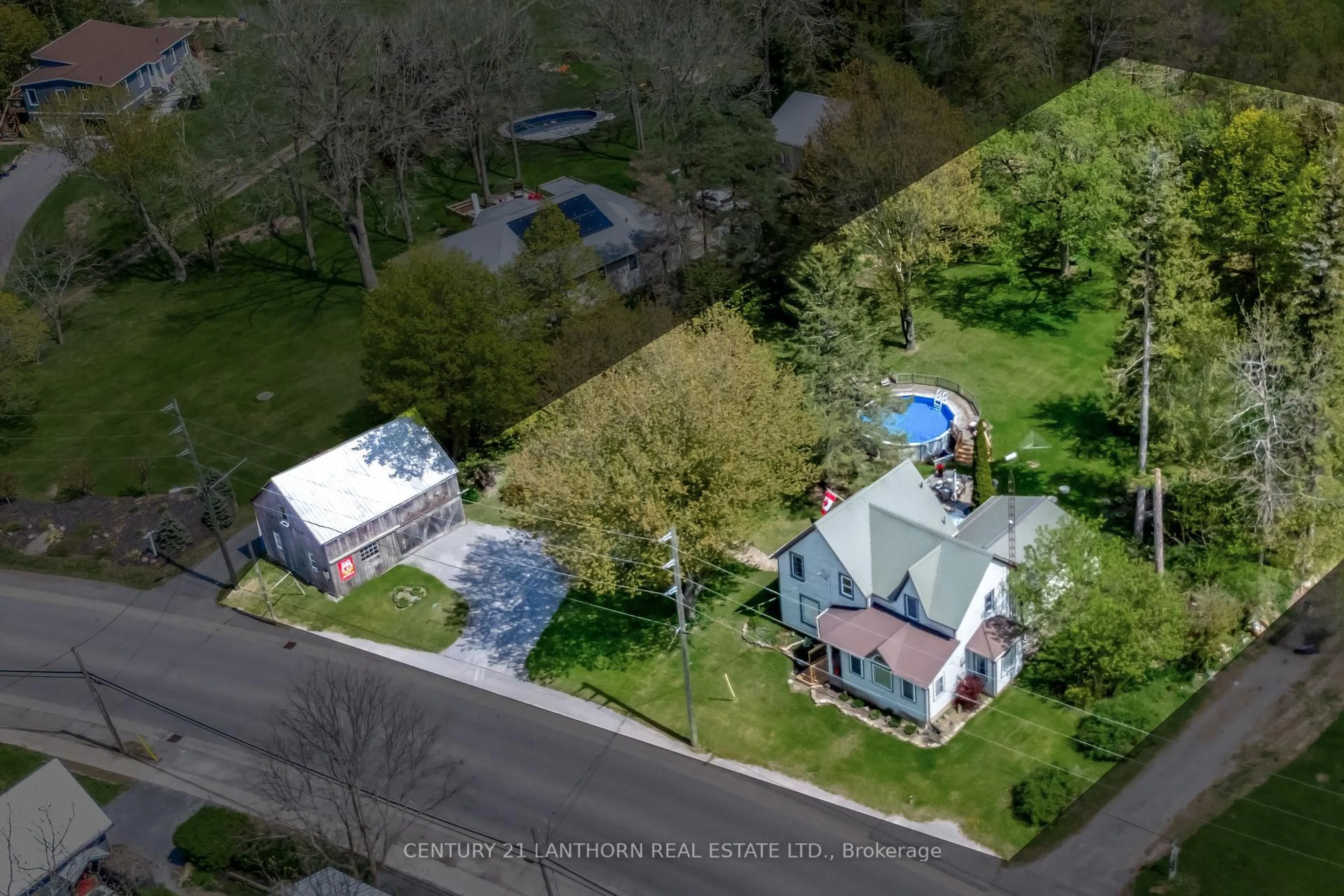 A pic from outside/outdoor area/front of a property/back of a property/a pic from drone, street for 1647 County Road 10 N/A, Prince Edward County Ontario K0K 1P0