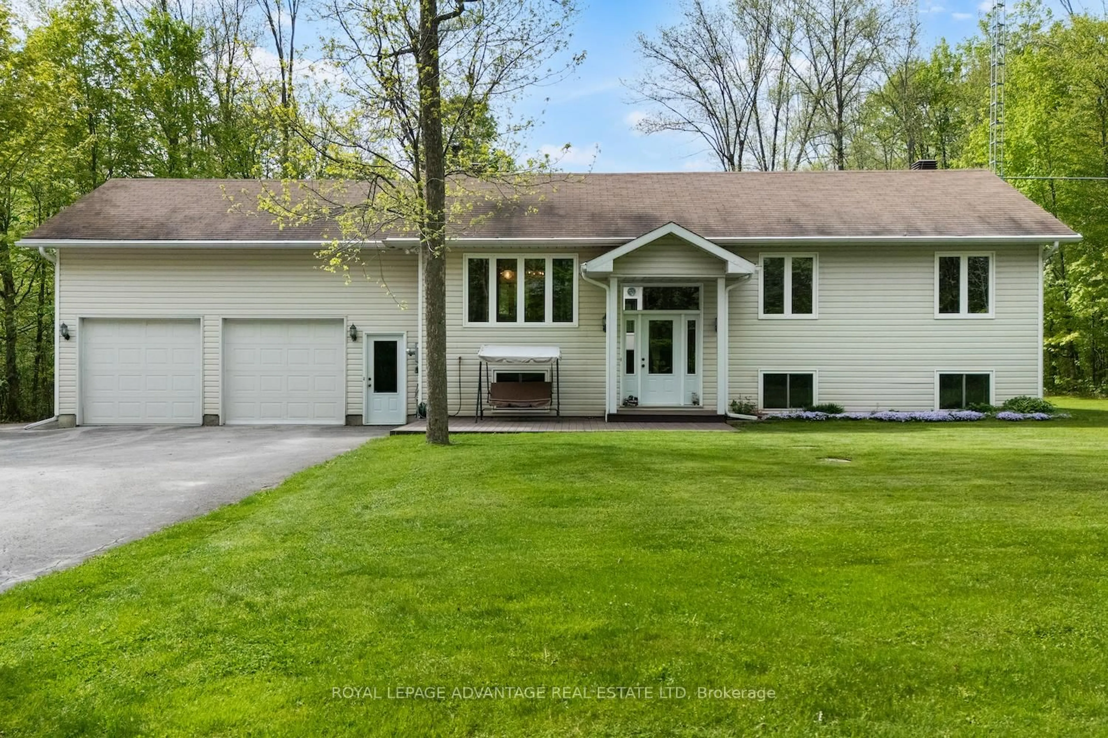 Home with vinyl exterior material, street for 122 McGuire Rd, Montague Ontario K7A 0H7