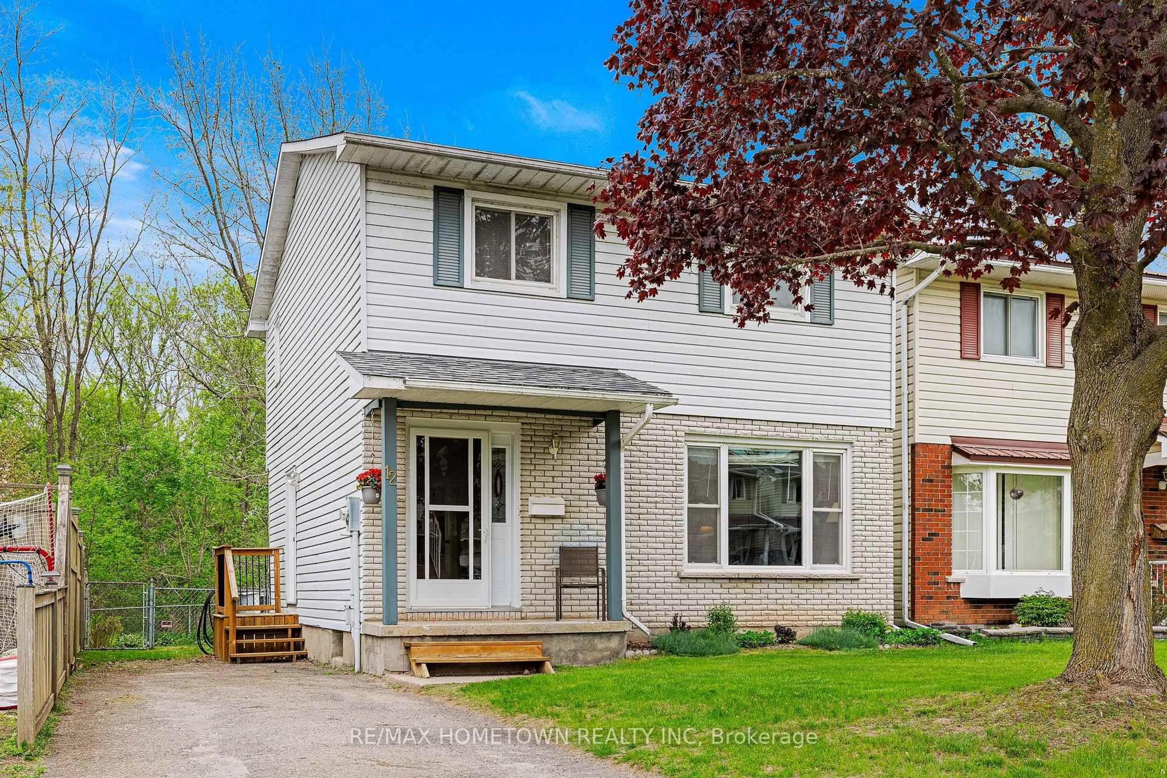 Home with vinyl exterior material, street for 12 Karolina St, Brockville Ontario K6V 6L4
