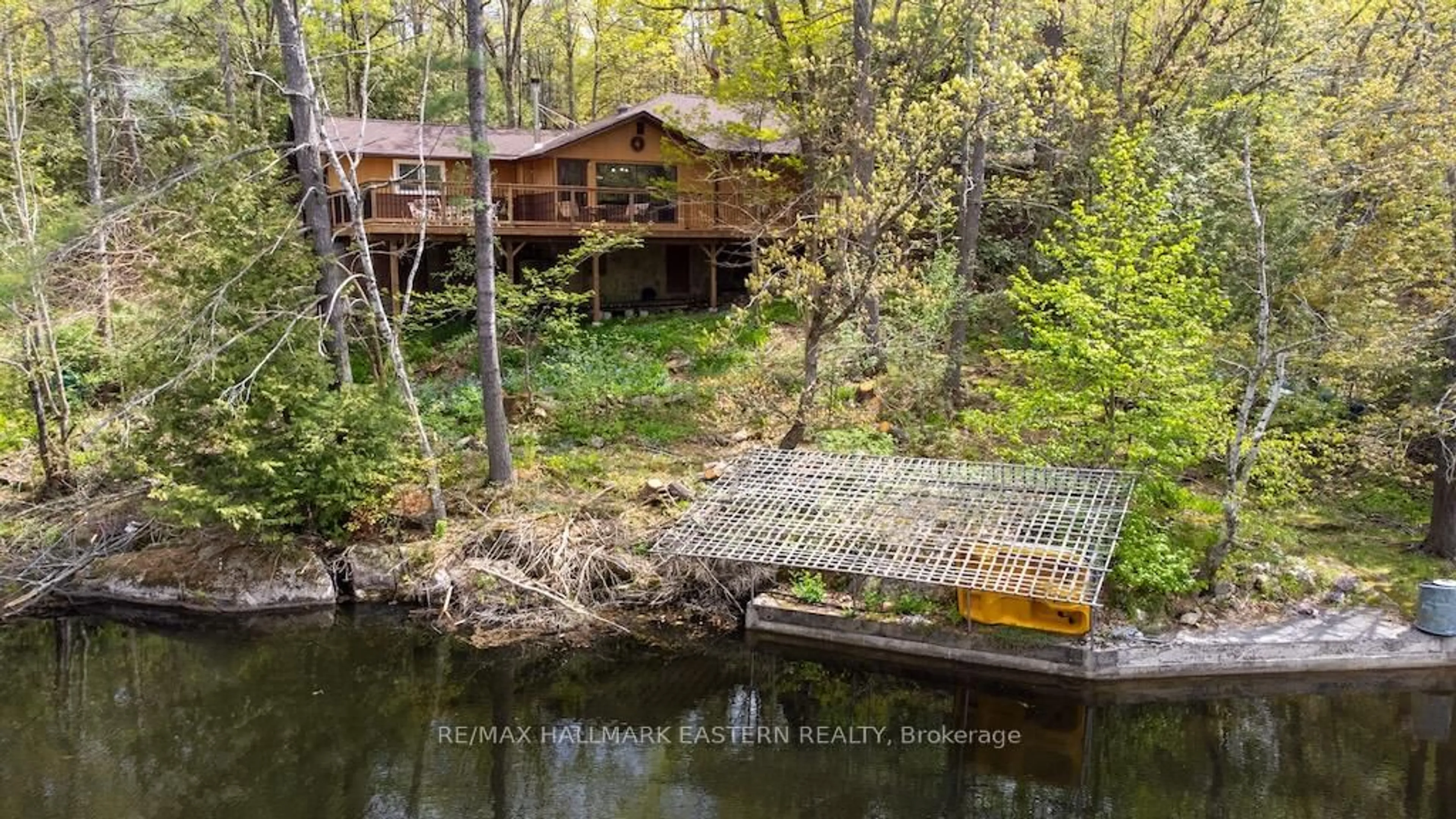 A pic from outside/outdoor area/front of a property/back of a property/a pic from drone, water/lake/river/ocean view for 3566 Rock Crossway Lane, Selwyn Ontario K0L 2H0