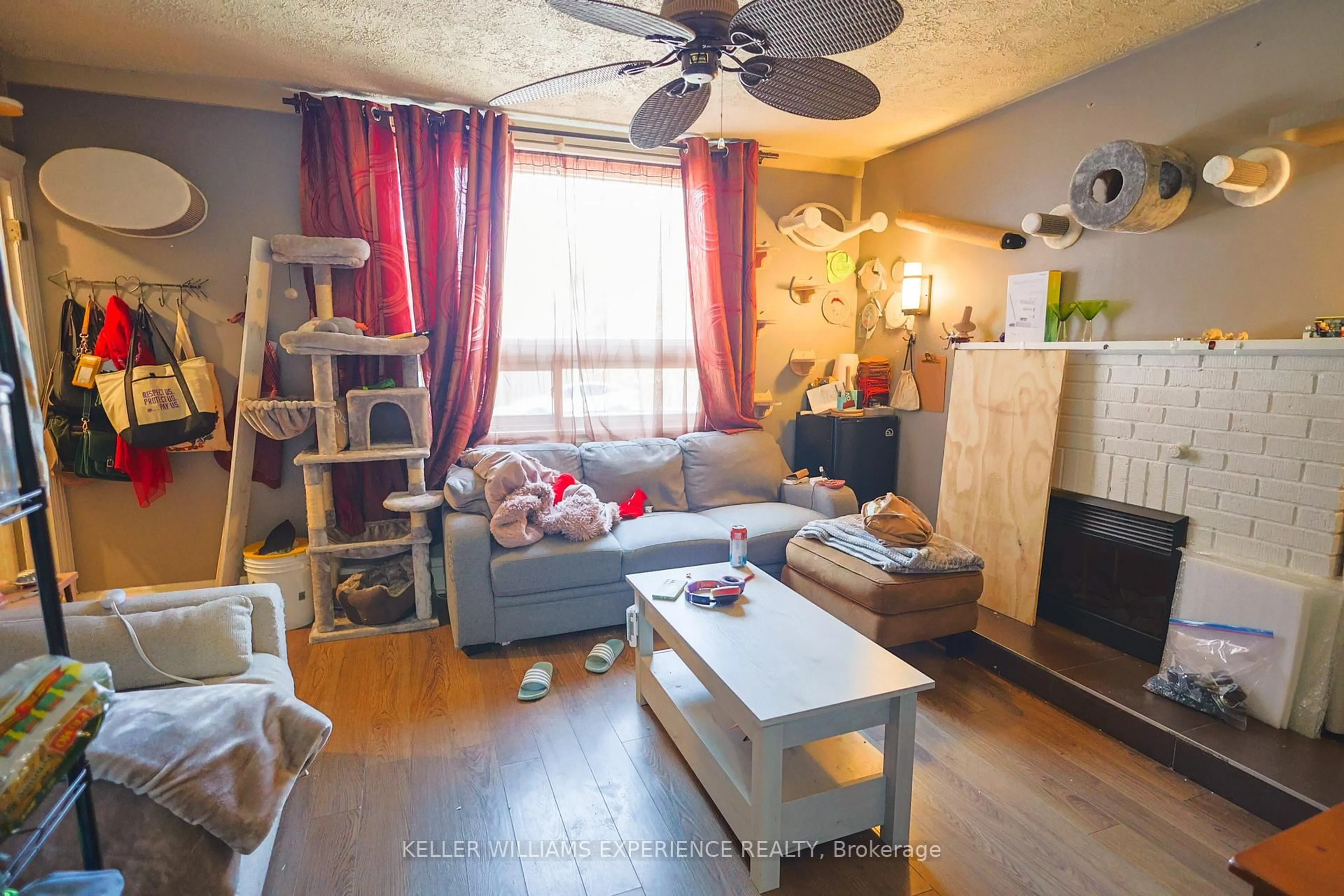 Living room with furniture, wood/laminate floor for 190 Patterson St, Greater Sudbury Ontario P3C 2J7