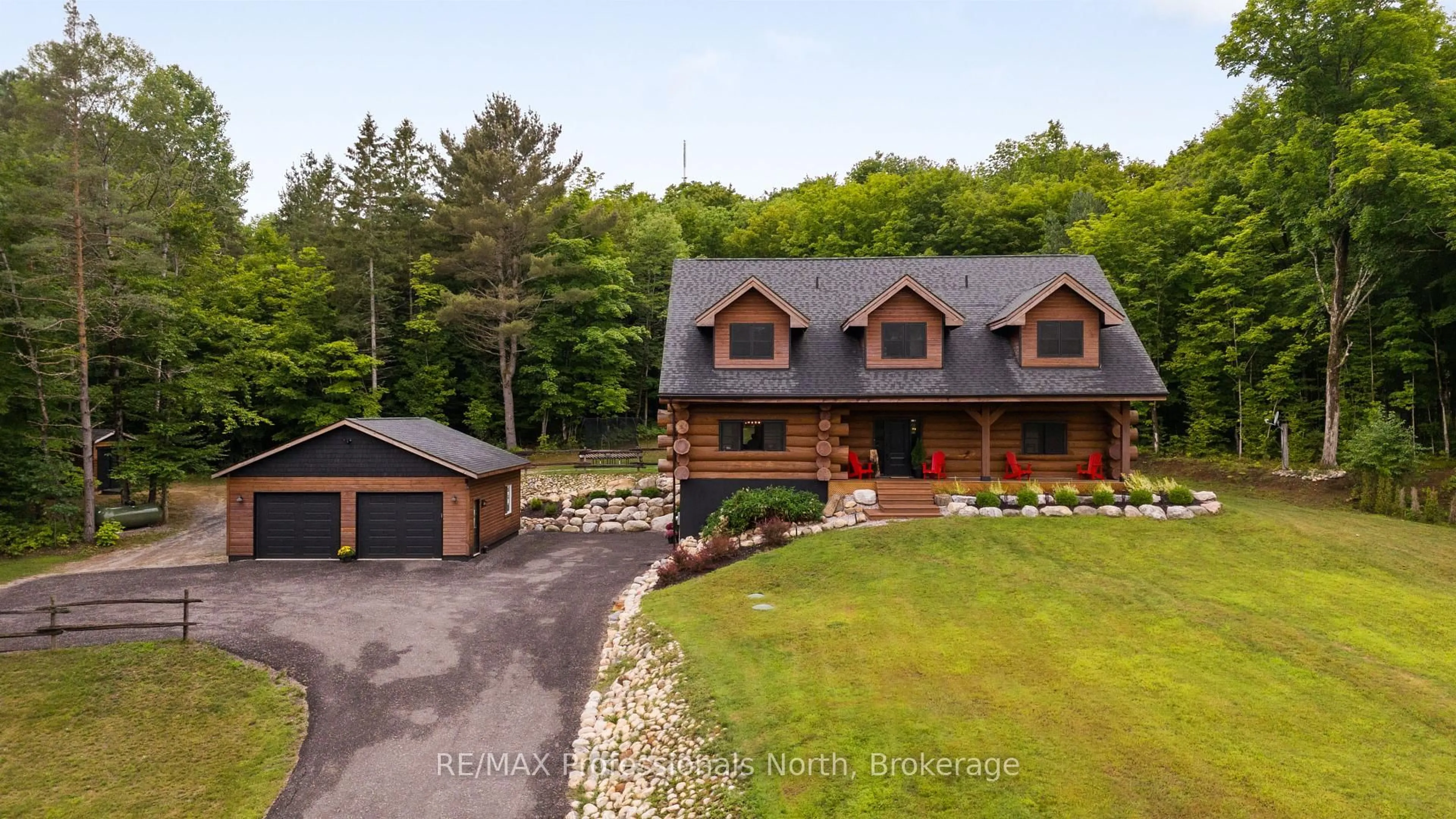 A pic from outside/outdoor area/front of a property/back of a property/a pic from drone, unknown for 44 NORTH WASEOSA LAKE Rd, Huntsville Ontario P1H 2J4