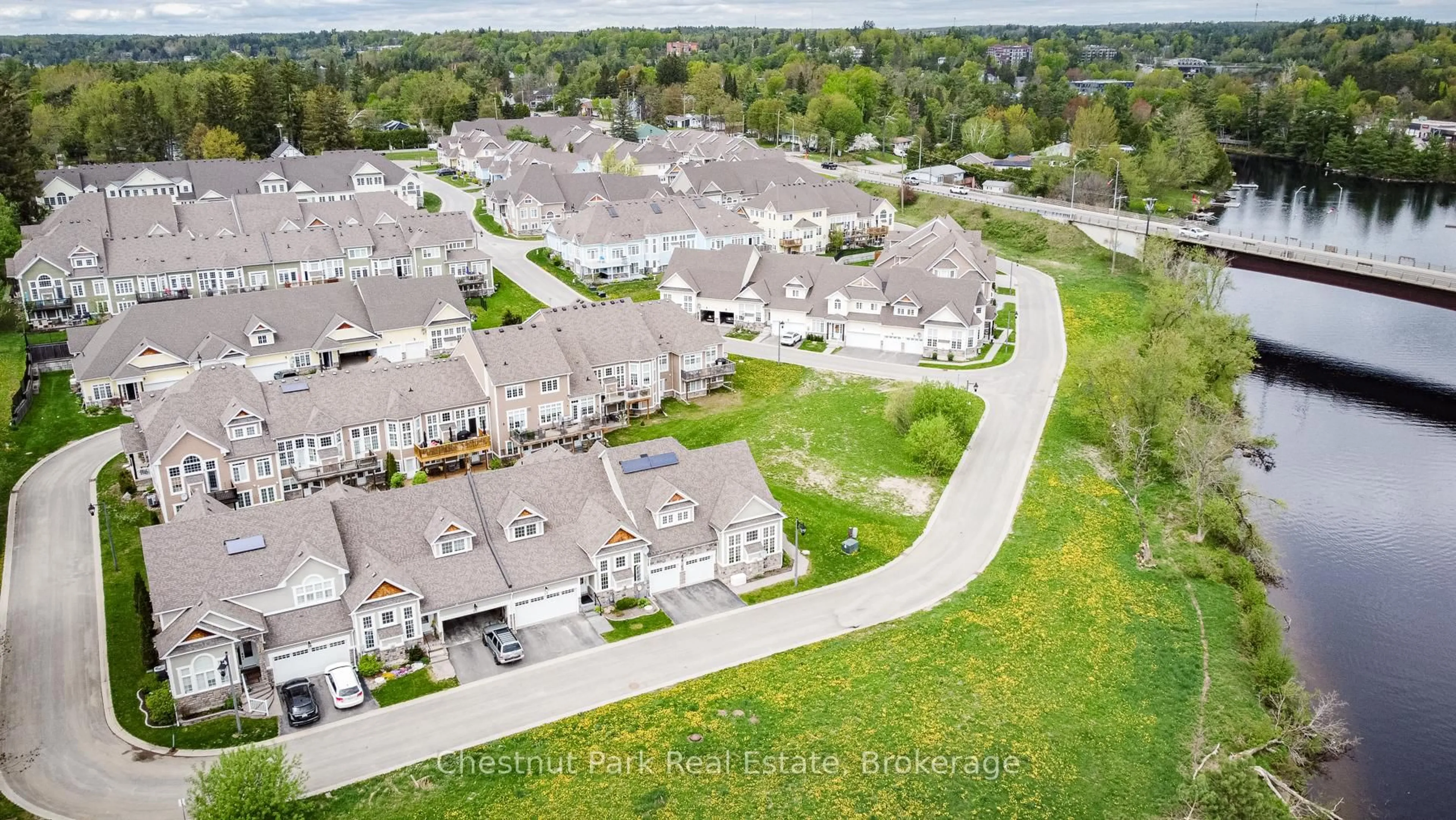 A pic from outside/outdoor area/front of a property/back of a property/a pic from drone, street for 24 Kent Cres, Bracebridge Ontario P1L 0B7