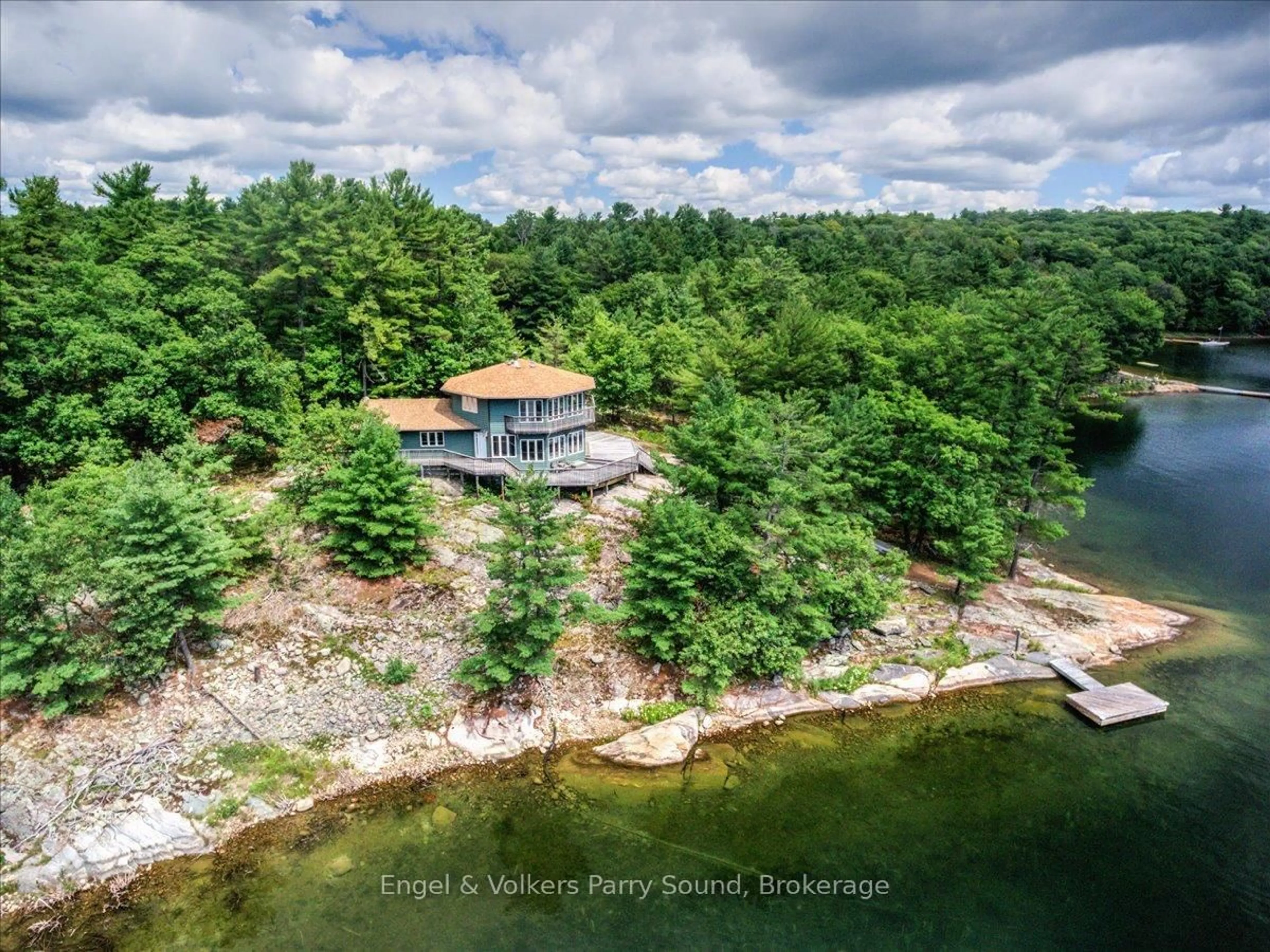 A pic from outside/outdoor area/front of a property/back of a property/a pic from drone, water/lake/river/ocean view for 1 Loon Bay N/A, Carling Ontario P0G 1G0
