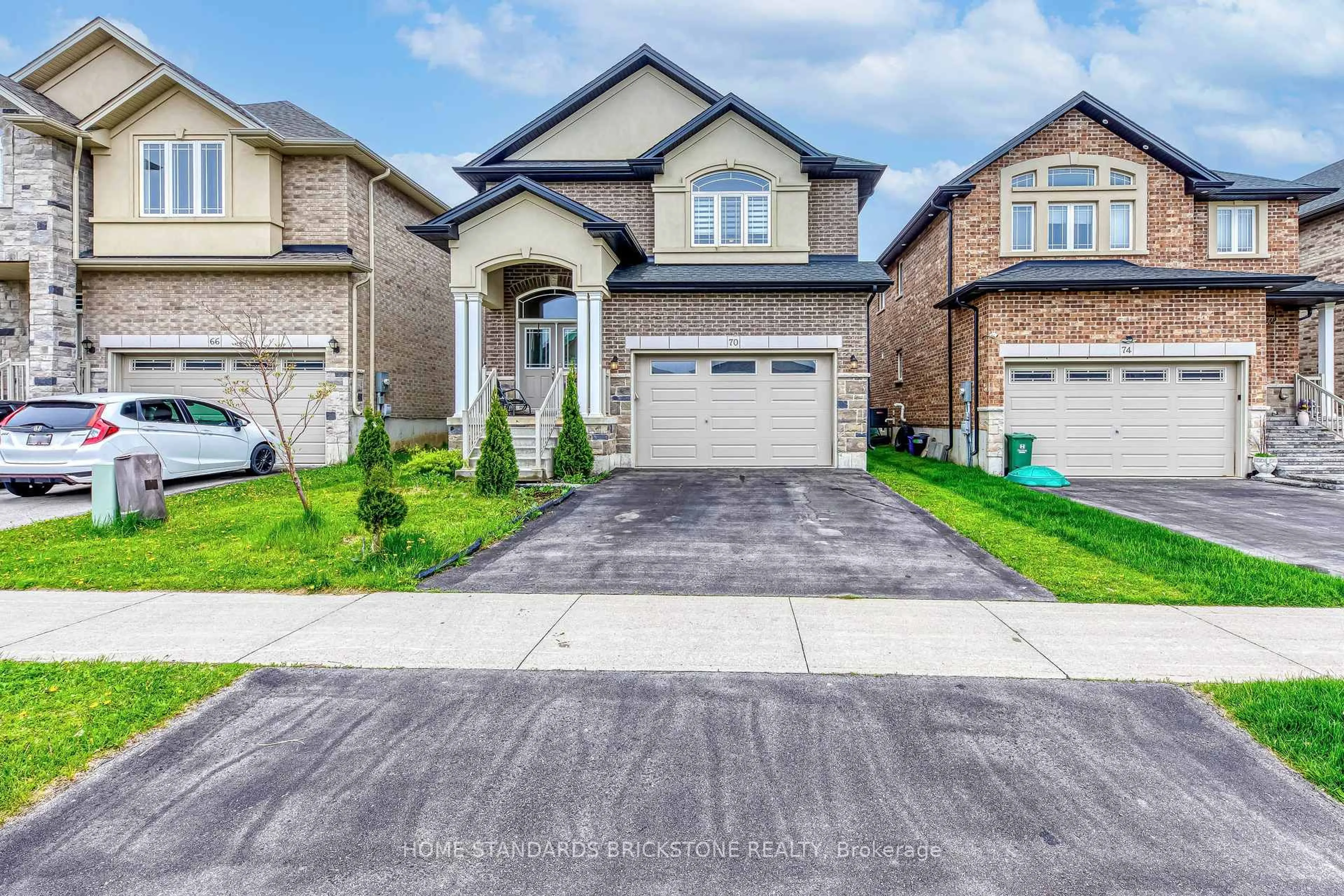 Home with brick exterior material, street for 70 Robertson Rd, Hamilton Ontario L9K 0H8