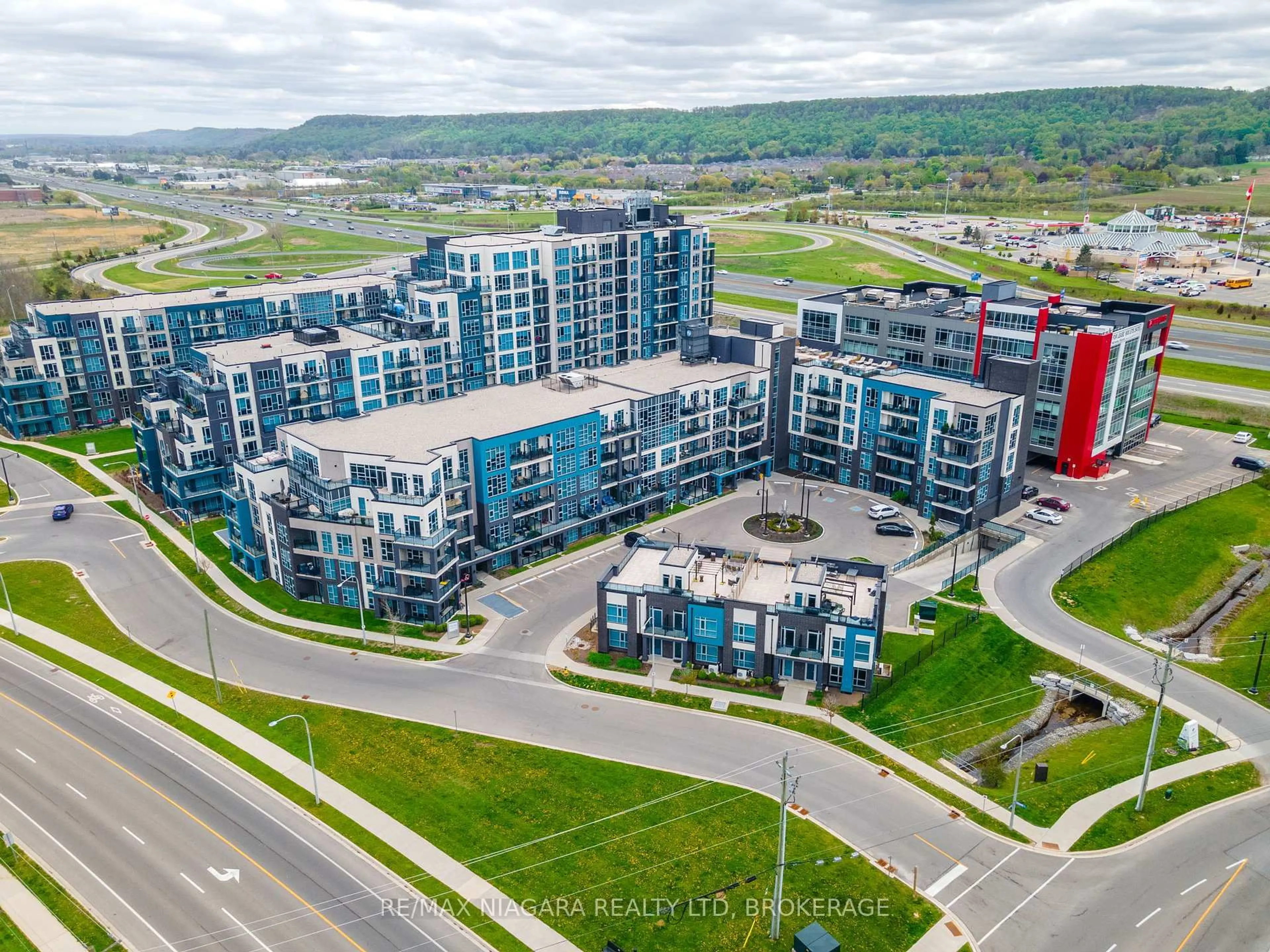 A pic from outside/outdoor area/front of a property/back of a property/a pic from drone, city buildings view from balcony for 10 Concord Pl #106, Grimsby Ontario L3M 0G6