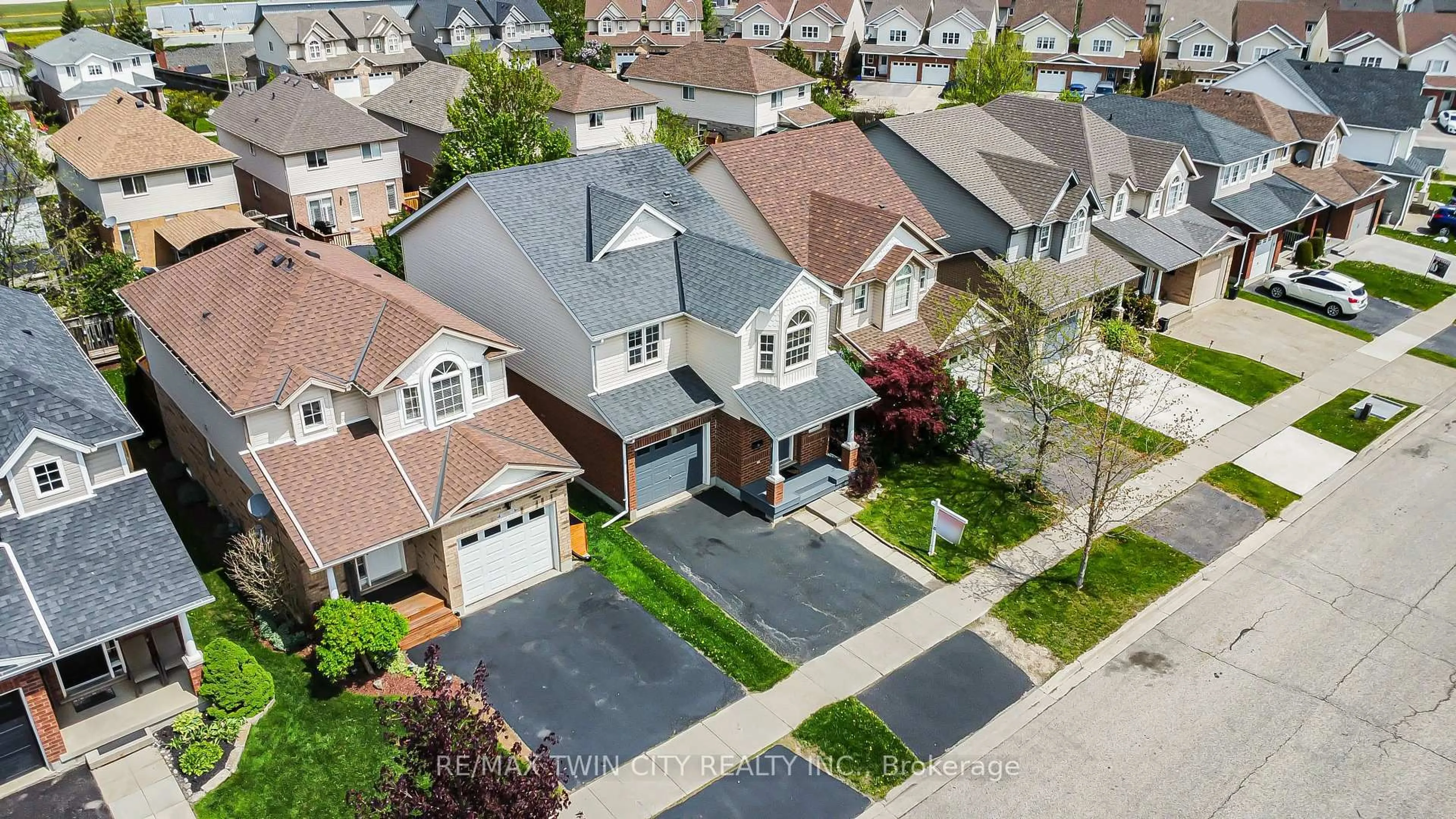 A pic from outside/outdoor area/front of a property/back of a property/a pic from drone, street for 74 Blue Lace Cres, Kitchener Ontario N2E 3X1