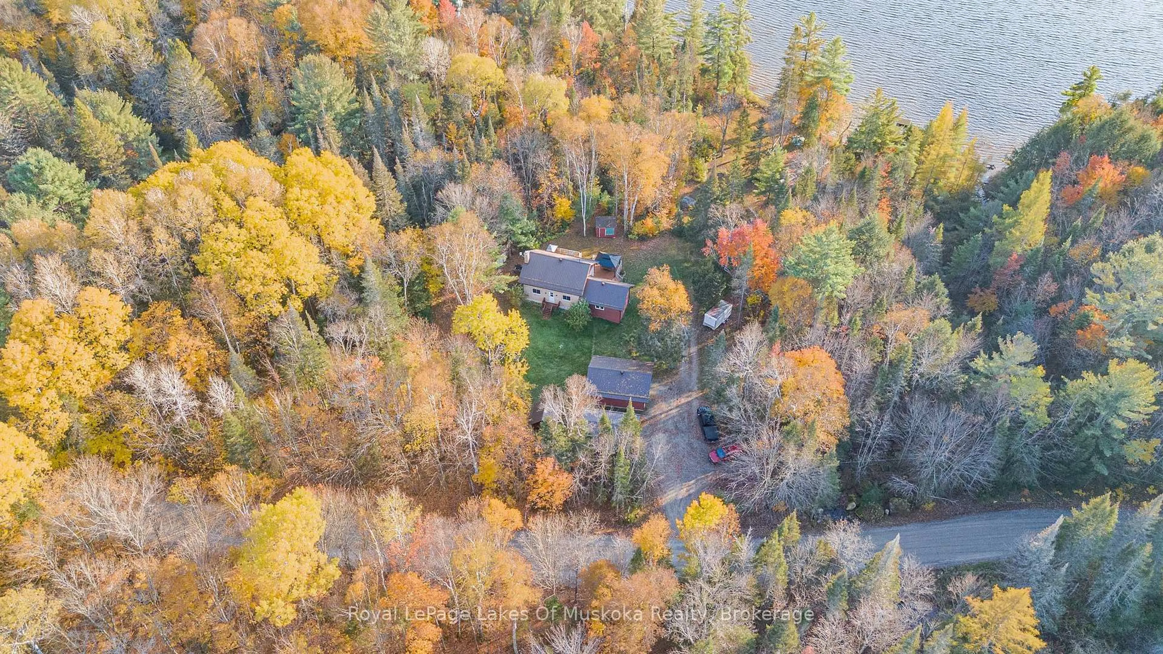 A pic from outside/outdoor area/front of a property/back of a property/a pic from drone, water/lake/river/ocean view for 128 Cheer Lake Rd, Strong Ontario P0A 1X0