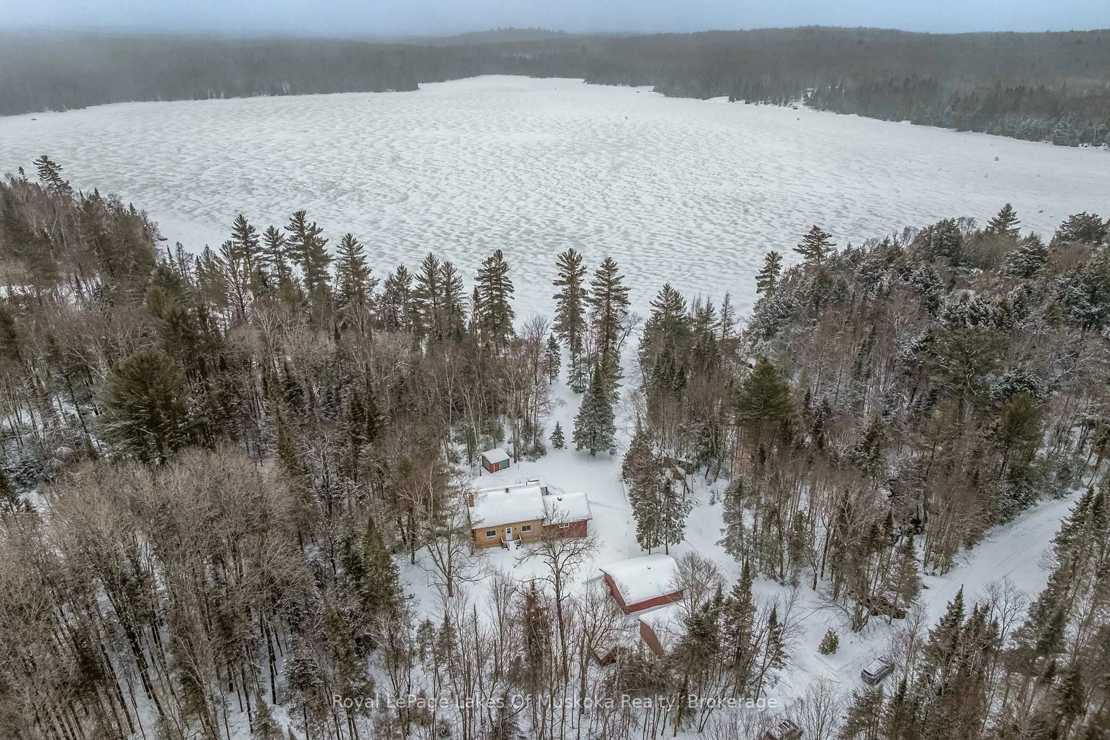 A pic from outside/outdoor area/front of a property/back of a property/a pic from drone, unknown for 128 Cheer Lake Rd, Strong Ontario P0A 1X0