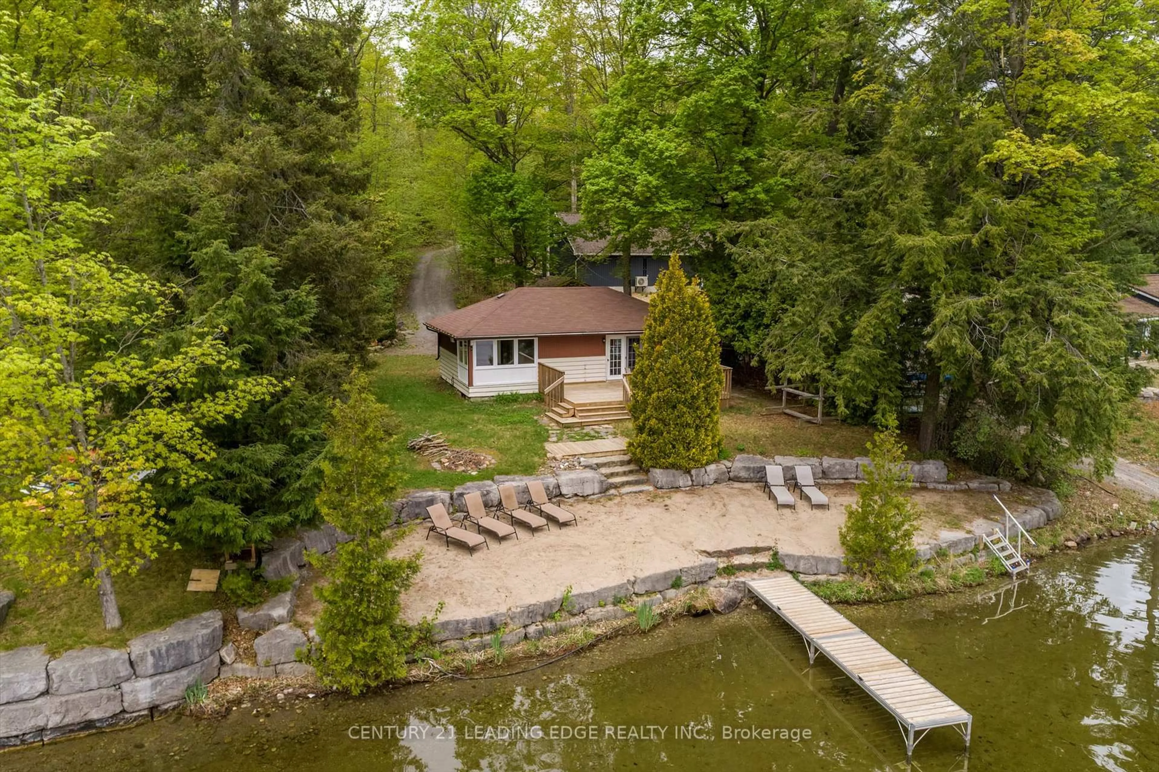 A pic from outside/outdoor area/front of a property/back of a property/a pic from drone, water/lake/river/ocean view for 1963 WHITE LAKE Rd, Douro-Dummer Ontario K0L 2H0