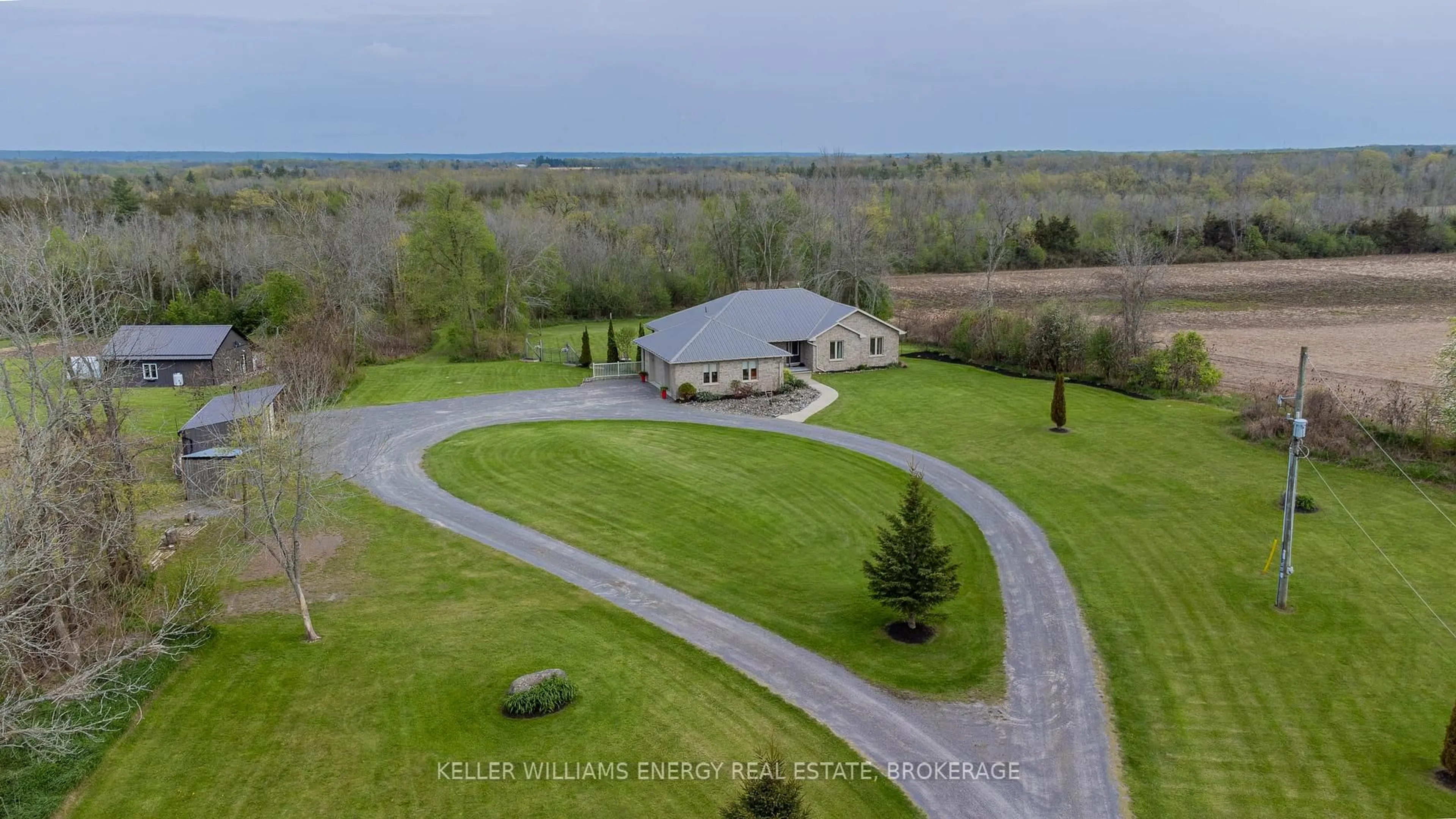 A pic from outside/outdoor area/front of a property/back of a property/a pic from drone, water/lake/river/ocean view for 370 Fish Lake Rd, Prince Edward County Ontario K0K 1W0