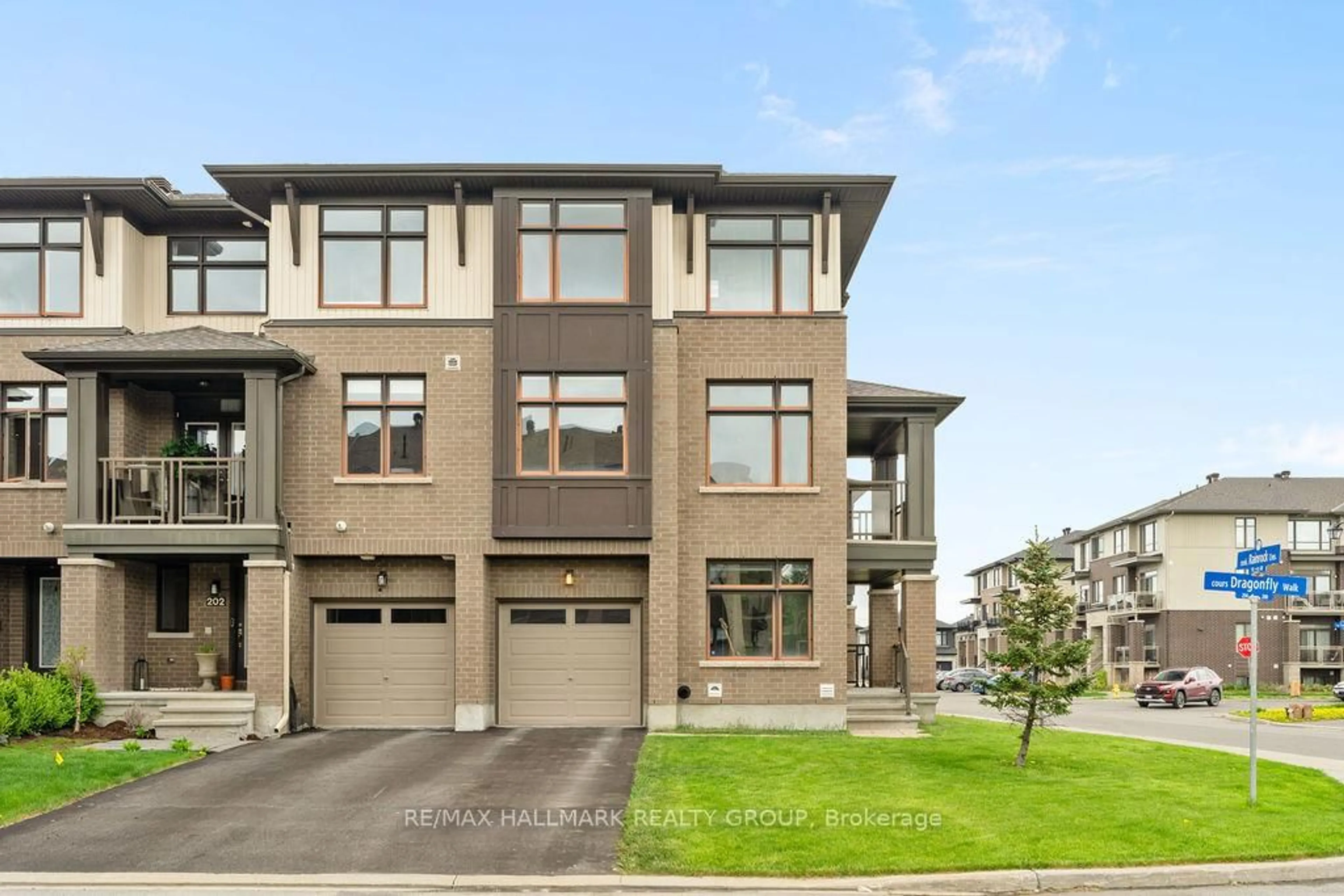 Home with brick exterior material, street for 200 Dragonfly Walk, Ottawa Ontario K1W 0J8