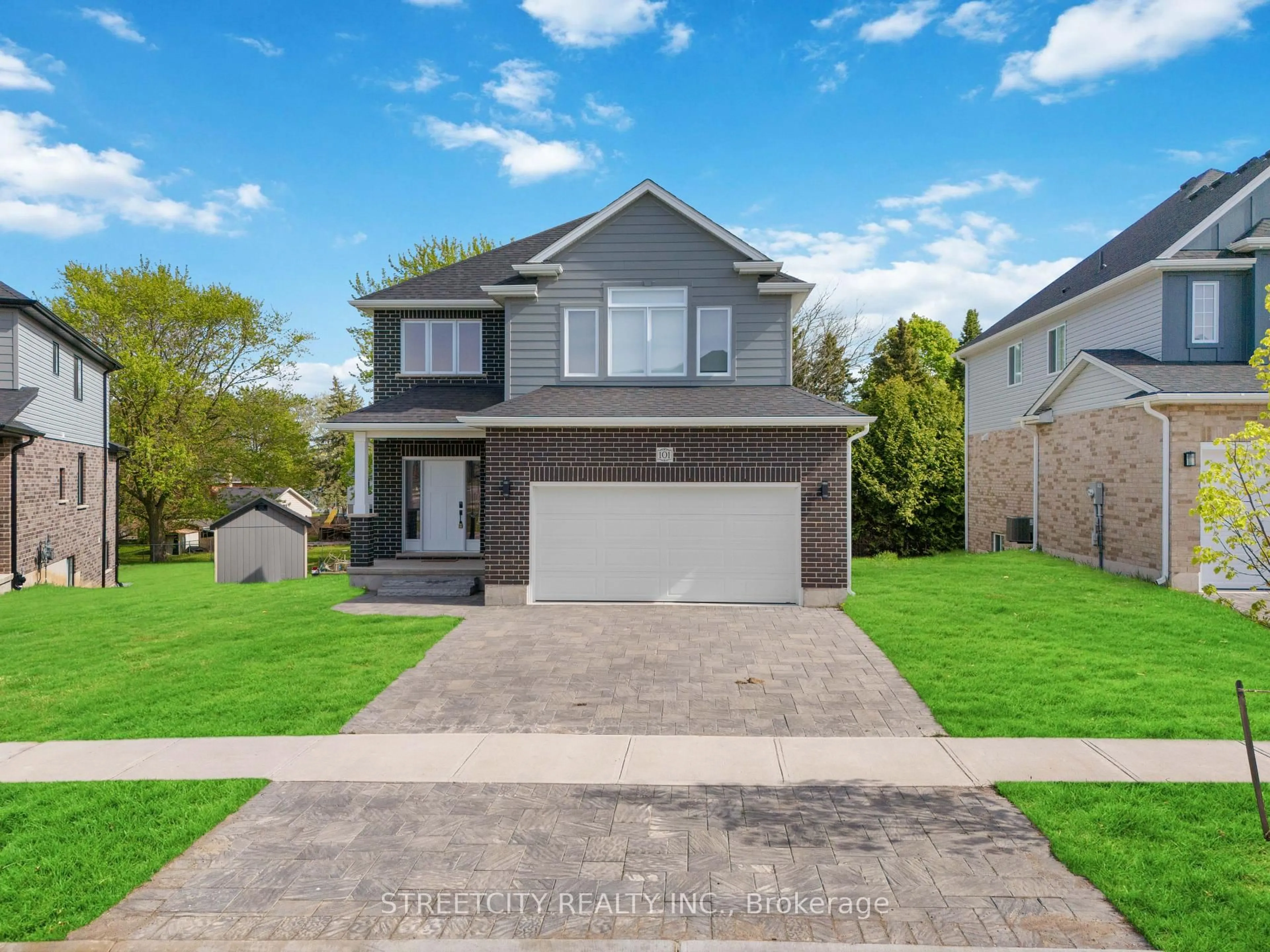 Home with brick exterior material, street for 101 Basil Cres, Middlesex Centre Ontario N0M 2A0