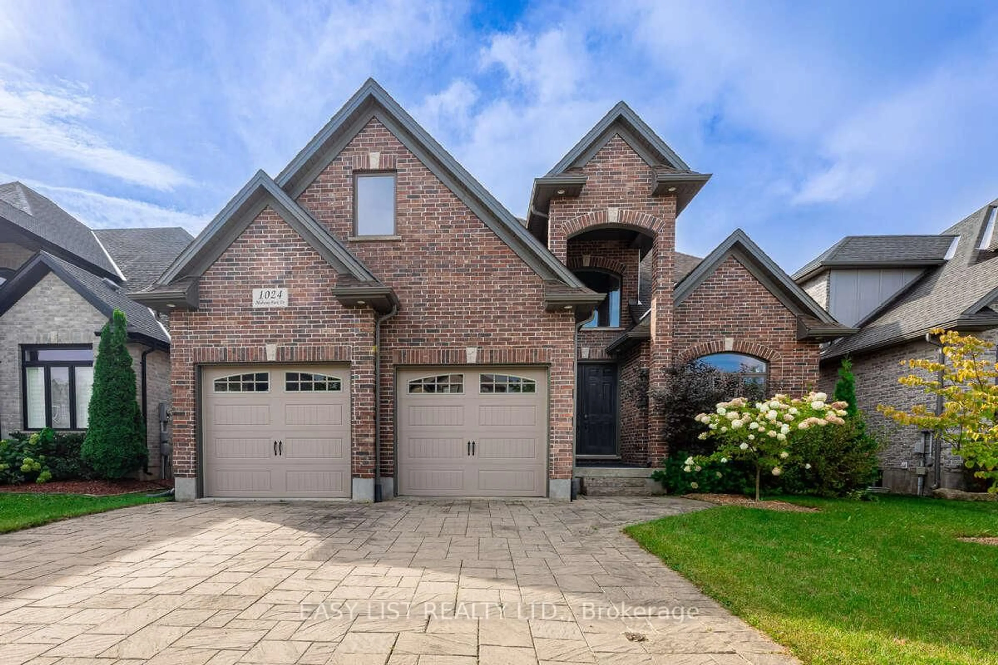 Home with brick exterior material, street for 1024 Medway Park Dr, London North Ontario N6G 0E4