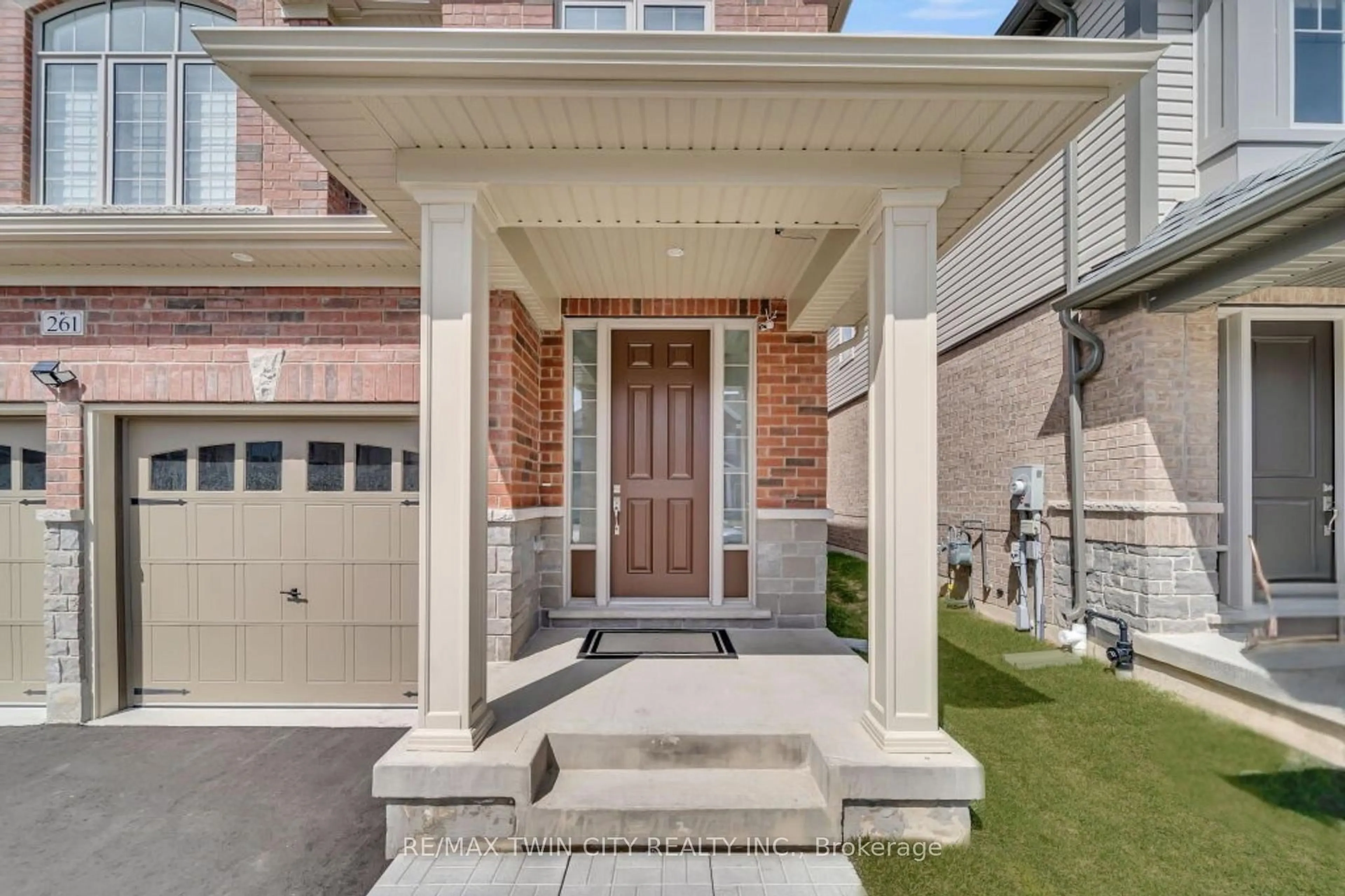 Home with brick exterior material, street for 261 Broadacre Dr, Kitchener Ontario N2R 0S6