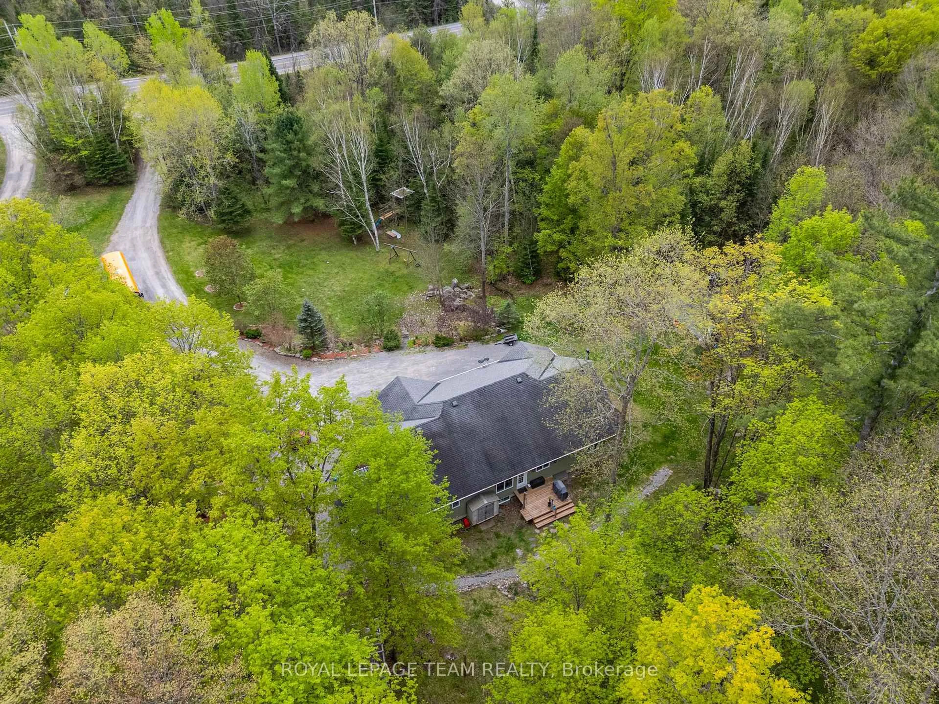 A pic from outside/outdoor area/front of a property/back of a property/a pic from drone, forest/trees view for 2504 Calabogie Rd, Calabogie Ontario K0J 1H0