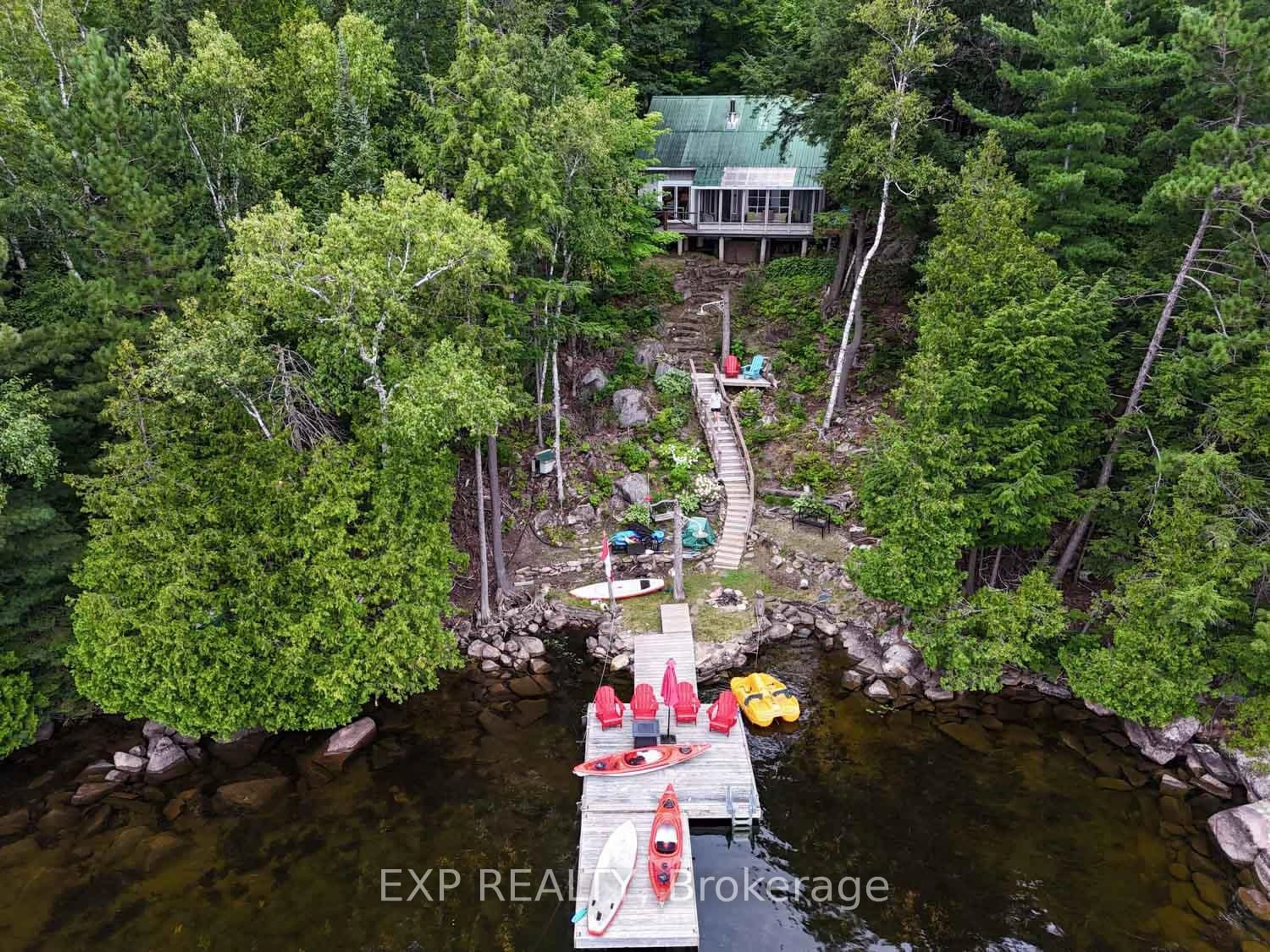 A pic from outside/outdoor area/front of a property/back of a property/a pic from drone, water/lake/river/ocean view for 273 Fire Route 330 N/A, Trent Lakes Ontario K0M 2A0