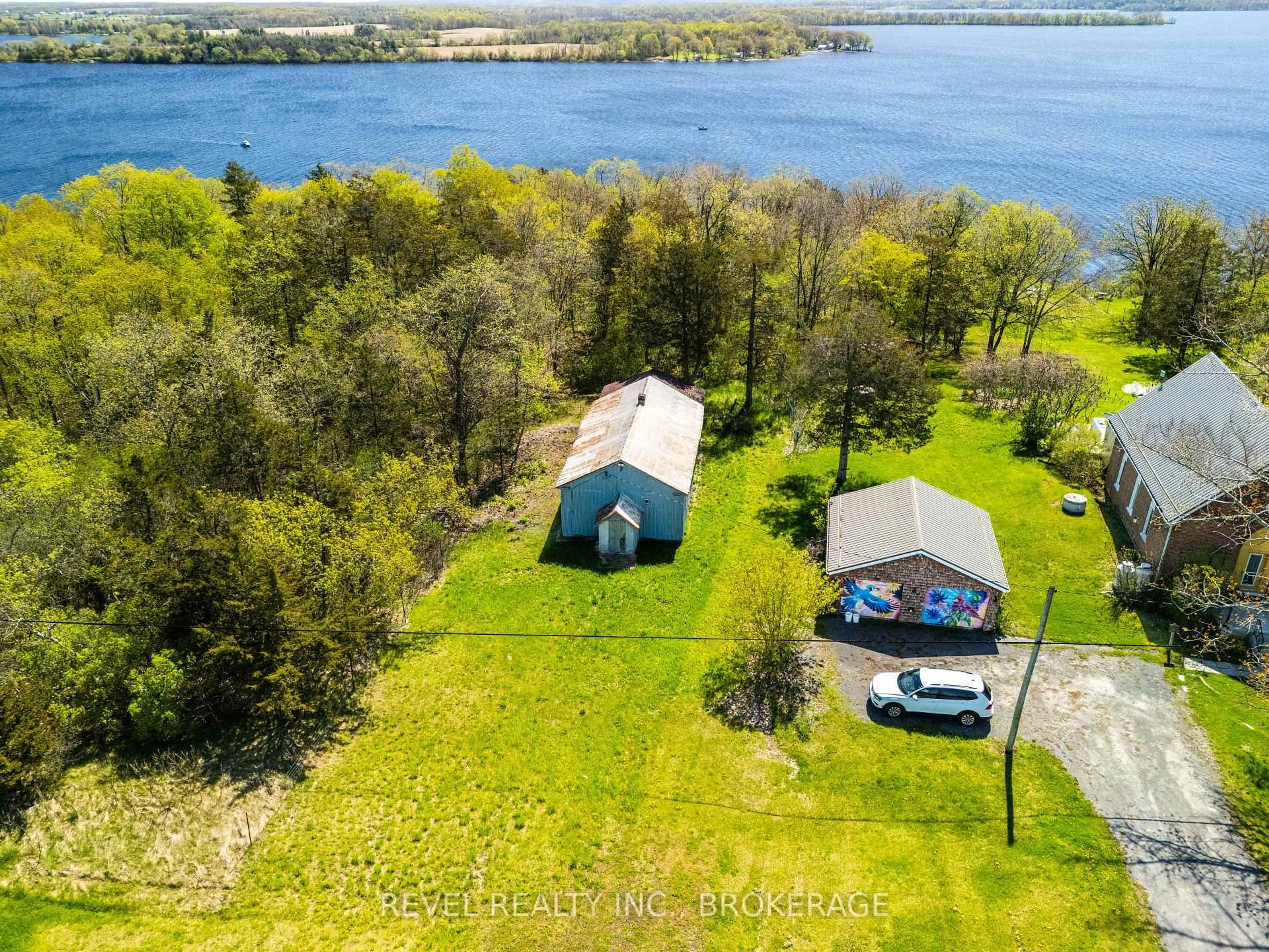 A pic from outside/outdoor area/front of a property/back of a property/a pic from drone, water/lake/river/ocean view for 2186 Highway 49 Highway, Prince Edward County Ontario K0K 2T0