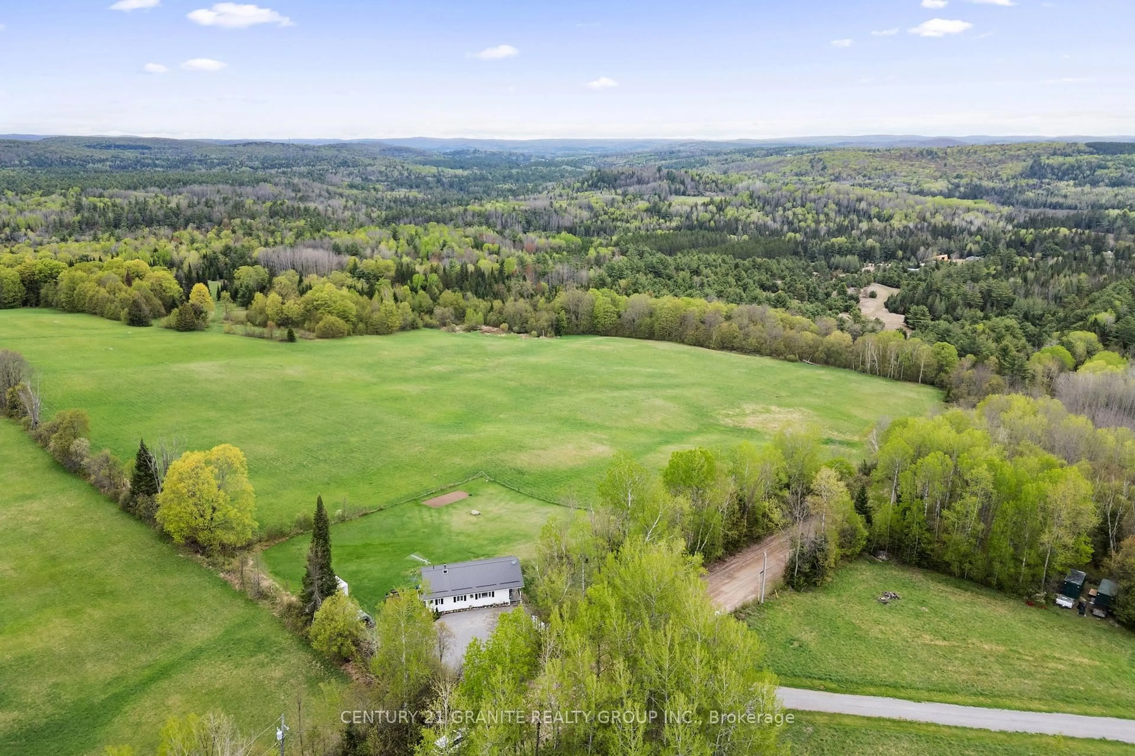 A pic from outside/outdoor area/front of a property/back of a property/a pic from drone, forest/trees view for 577 Hillsview Rd, Maynooth Ontario K0L 2S0