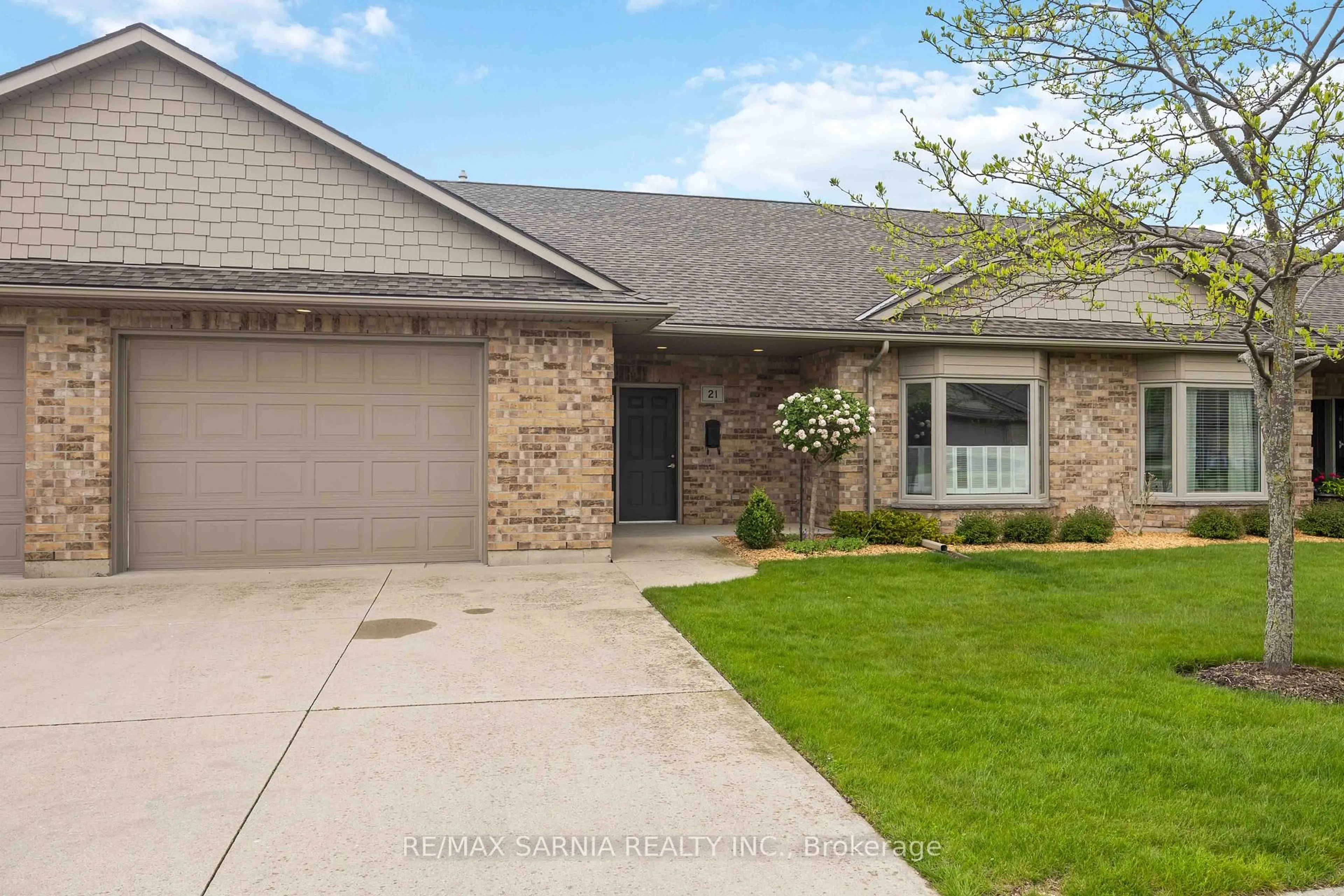 Home with brick exterior material, street for 5969 Townsend Line #21, Lambton Shores Ontario N0N 1J0